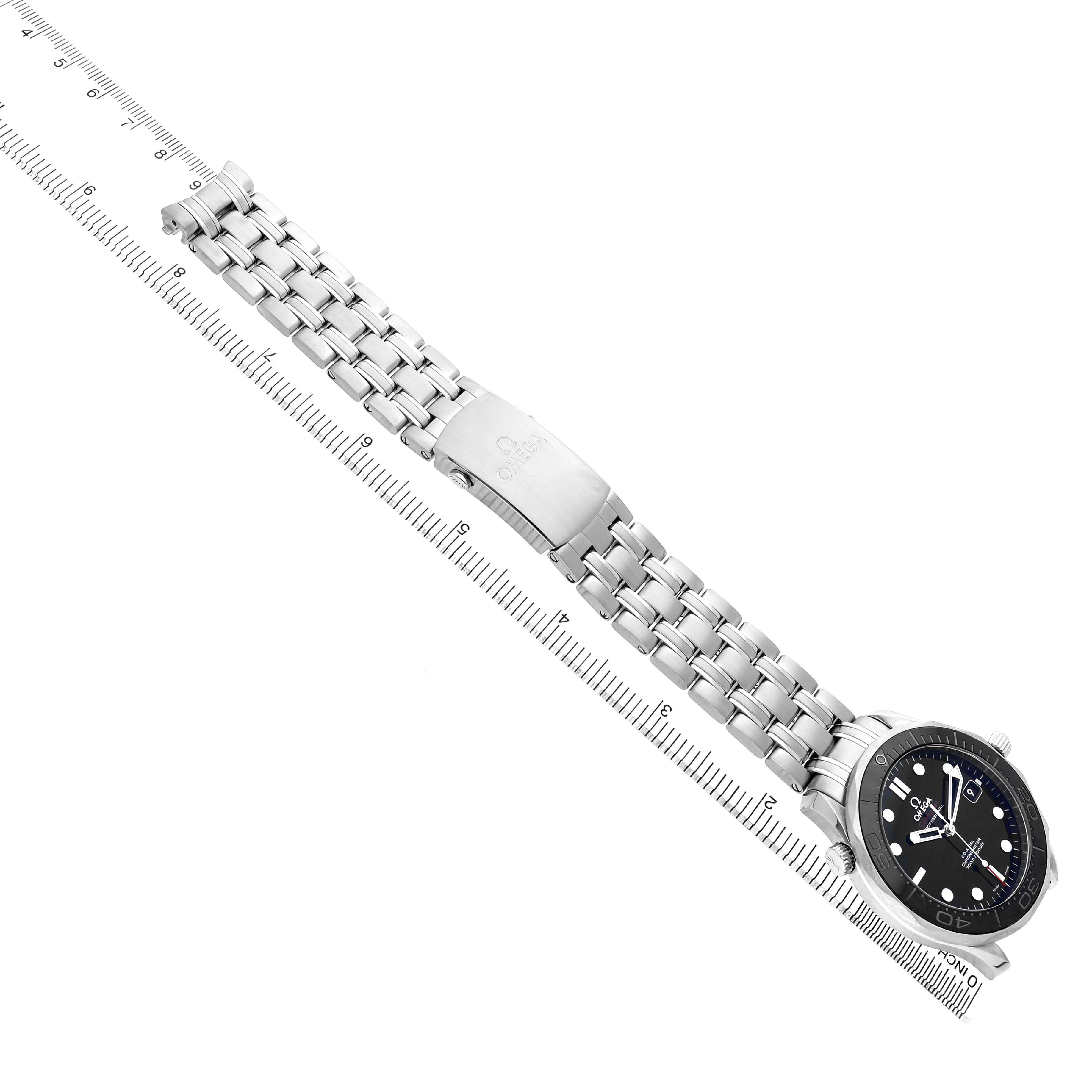 The Omega Seamaster 212.30.41.20.01.003 Men's Stainless Steel Black Dial watch is shown at a diagonal angle, highlighting the bracelet and clasp with a ruler for scale.