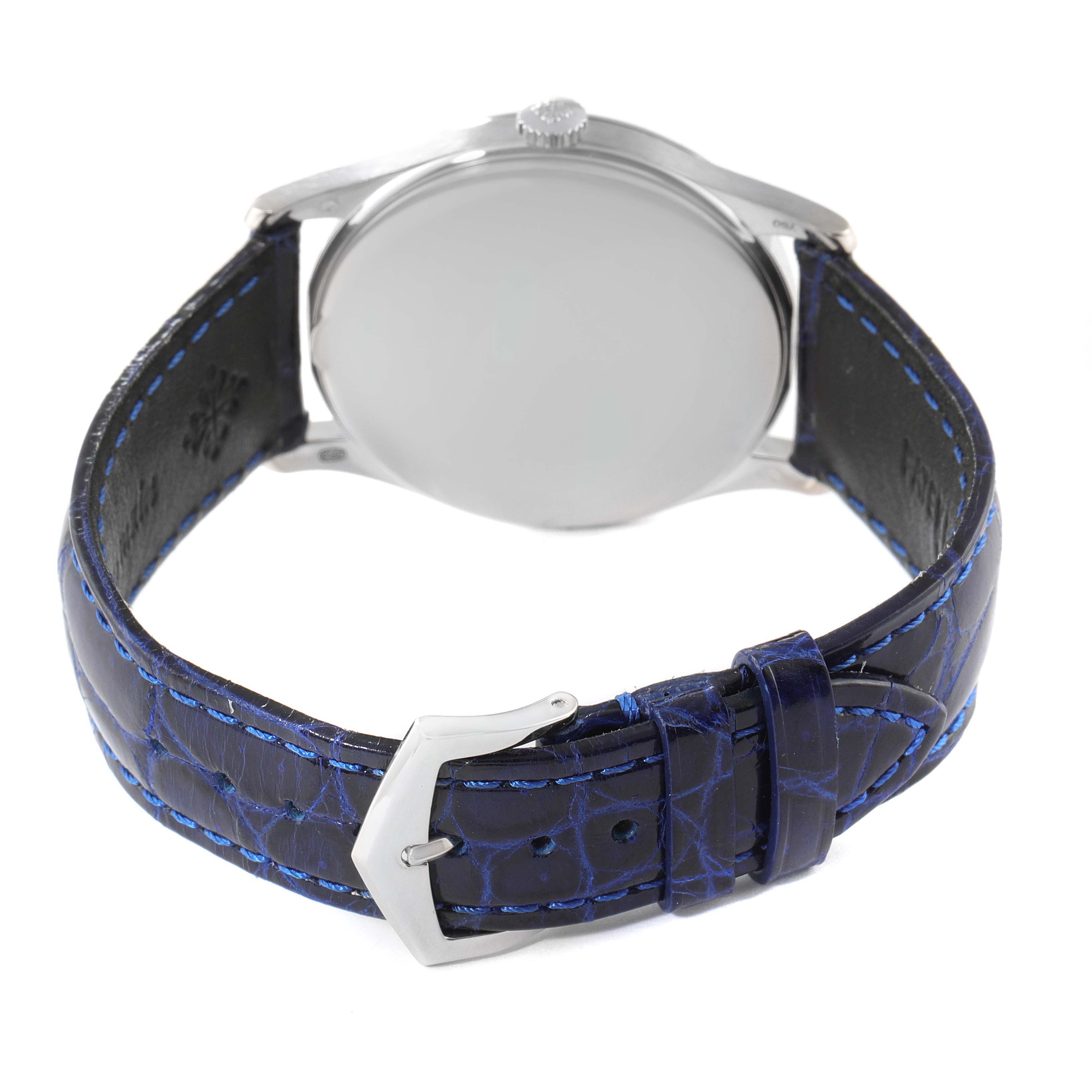 This image shows the back and strap of a Patek Philippe Calatrava 5196G Men's White Gold Silver Dial 5196G Men's White Gold Silver Dial watch, featuring a blue leather band and a metallic buckle.