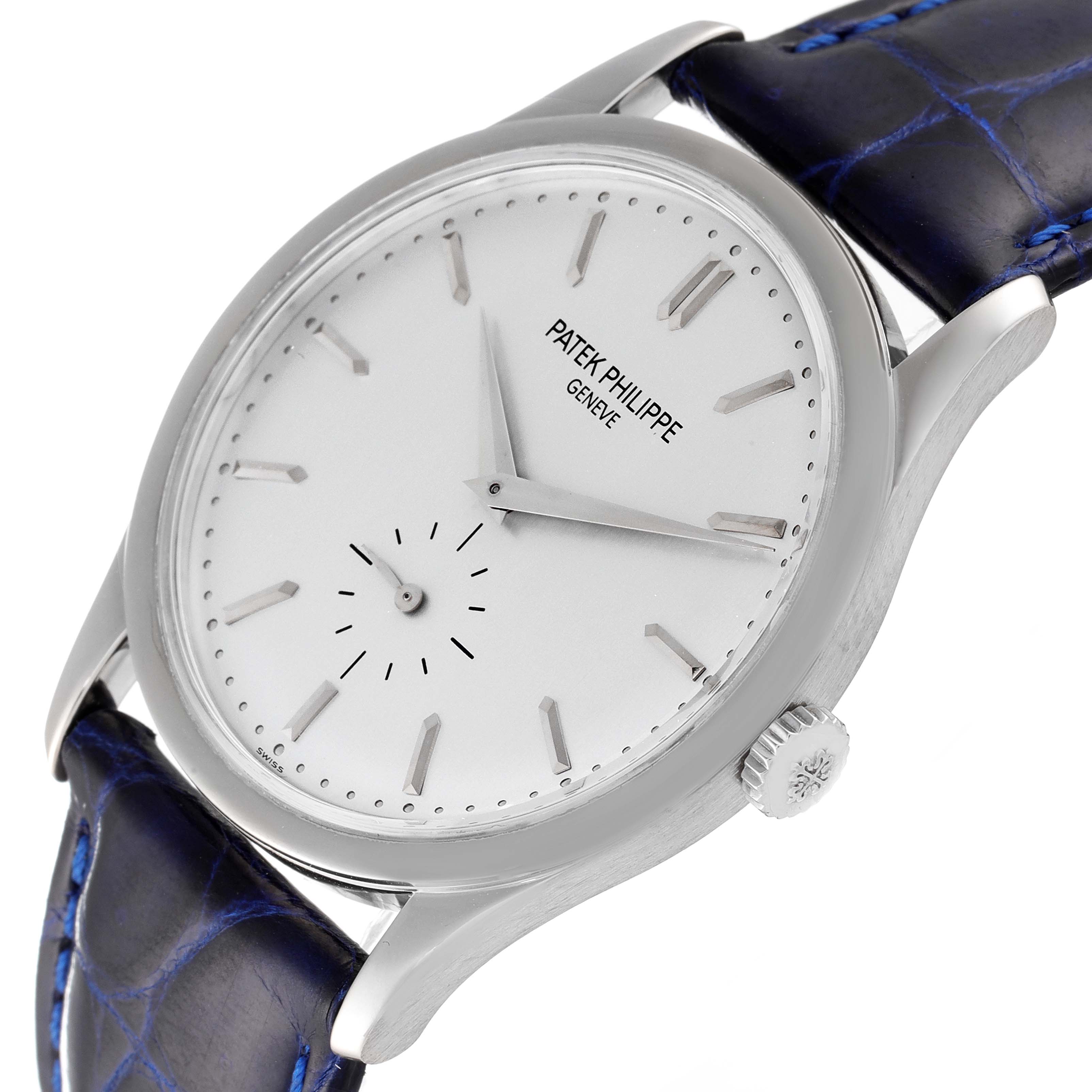 This image shows a Patek Philippe Calatrava 5196G Men's White Gold Silver Dial 5196G Men's White Gold Silver Dial watch at a slight angle, highlighting its face, crown, and leather strap.