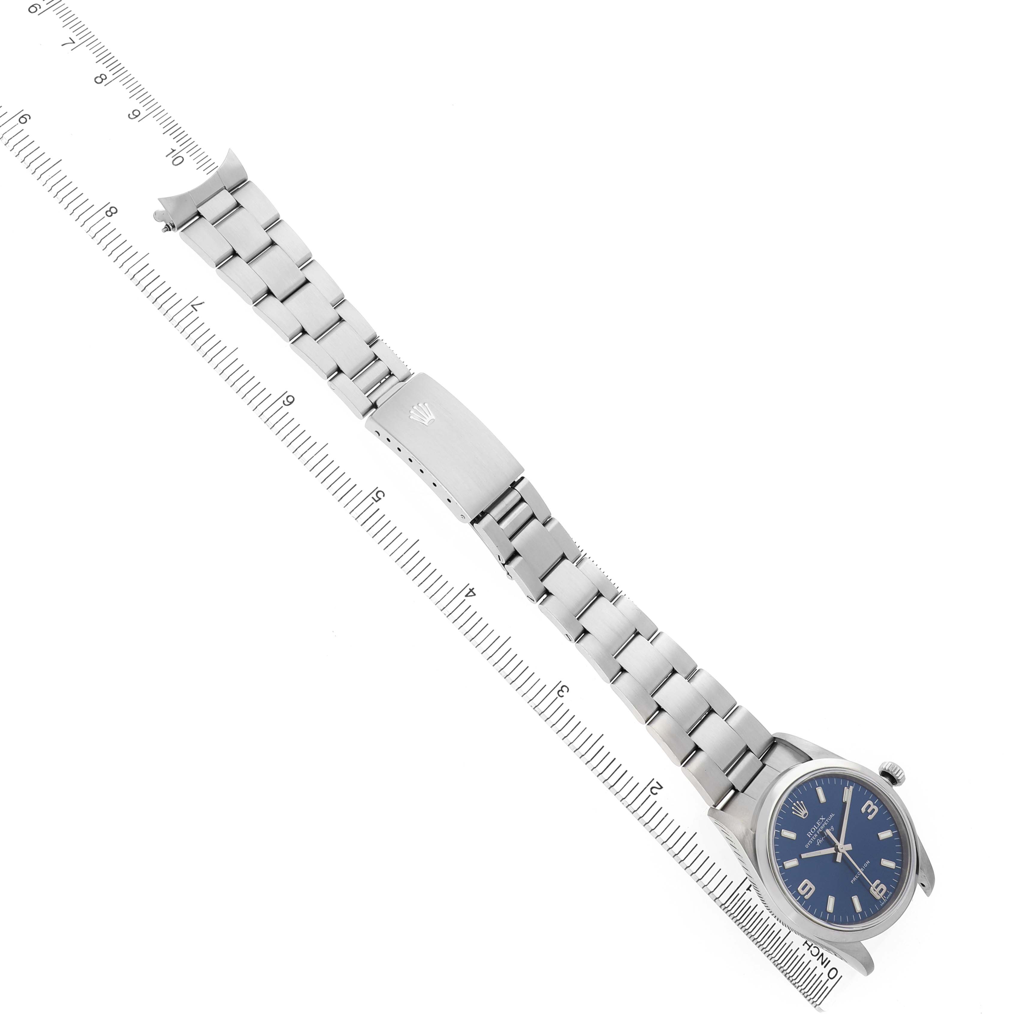 The Rolex Air-King 14000 Men's Stainless Steel Blue Dial watch is shown from a top-down angle, fully extended, displaying its bracelet and face.