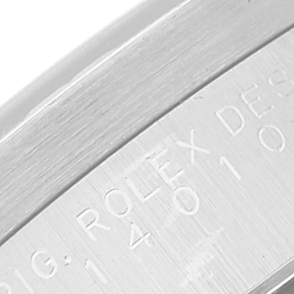 This image shows the engraved side of the bezel on a Rolex Air-King 14010 Men's Stainless Steel Blue Dial 14010 Men's Stainless Steel Blue Dial watch.