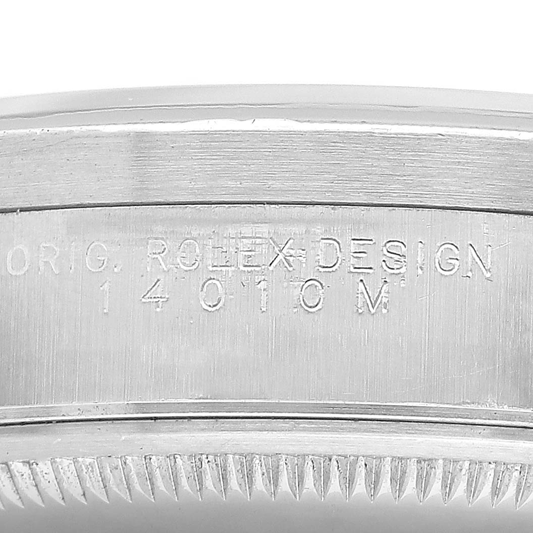 The image shows a close-up of the side engraving on the Rolex Air-King 14010 Men's Stainless Steel Blue Dial, focusing on the model number and design details.