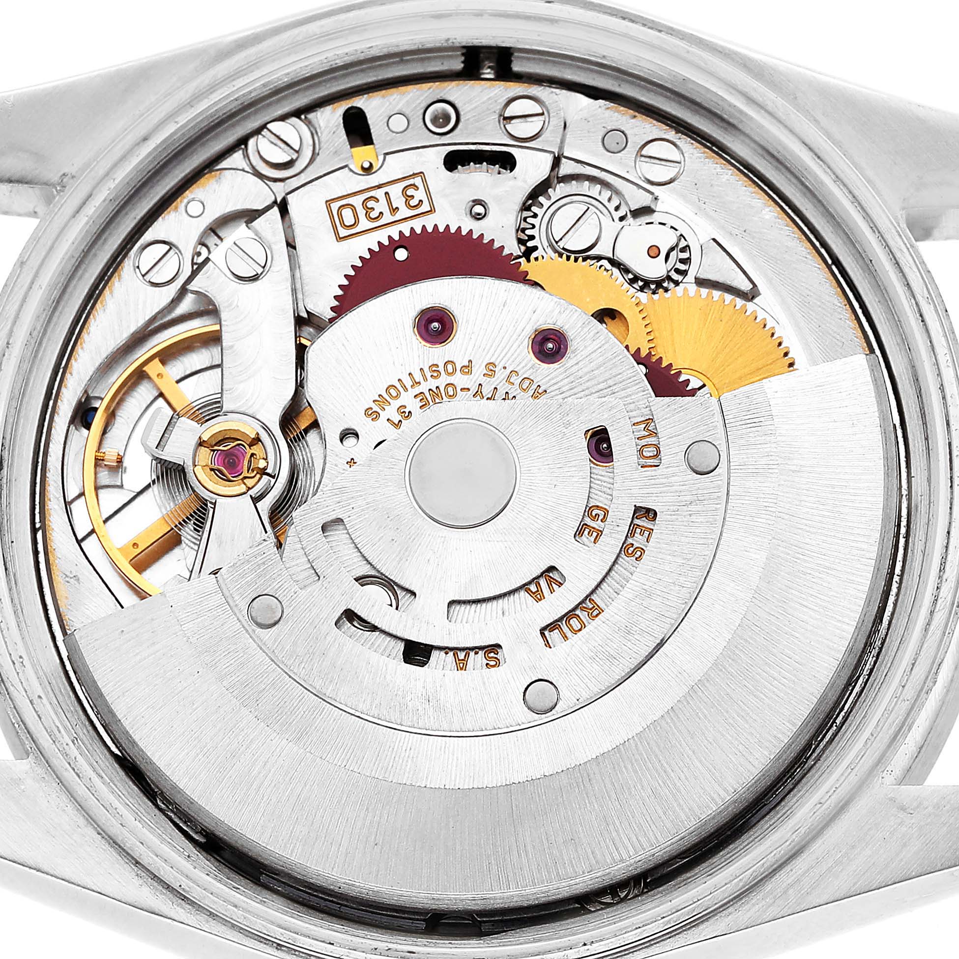 The image shows the movement of a Rolex Air-King 14010 Men's Stainless Steel Blue Dial watch from the back, highlighting the intricate gears and components.