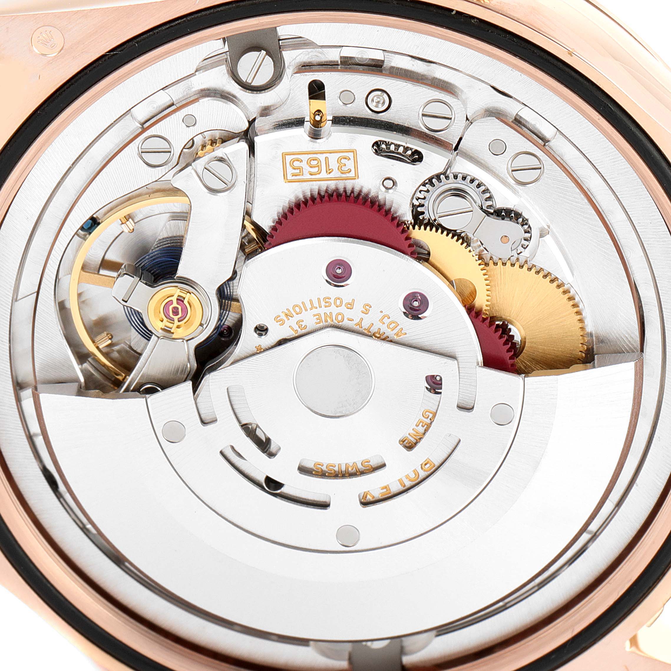 This is a close-up of the Rolex Cellini 50515 Men's Rose Gold Silver Dial 50515 Men's Rose Gold Silver Dial watch movement, showcasing gears, screws, and intricate mechanisms.