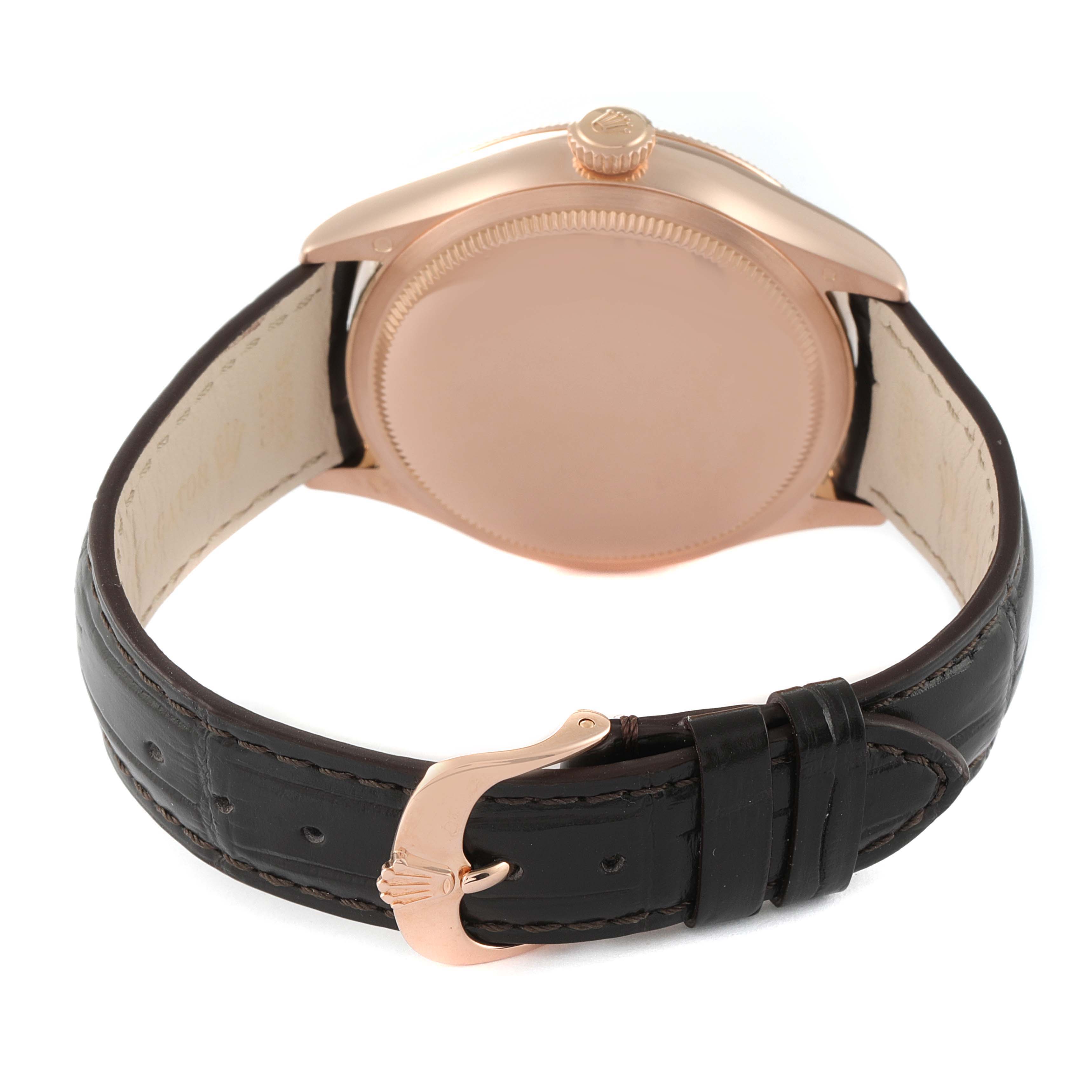 This image shows the back case, crown, and the leather strap with clasp of a Rolex Cellini 50515 Men's Rose Gold Silver Dial 50515 Men's Rose Gold Silver Dial model watch from a rear angle.
