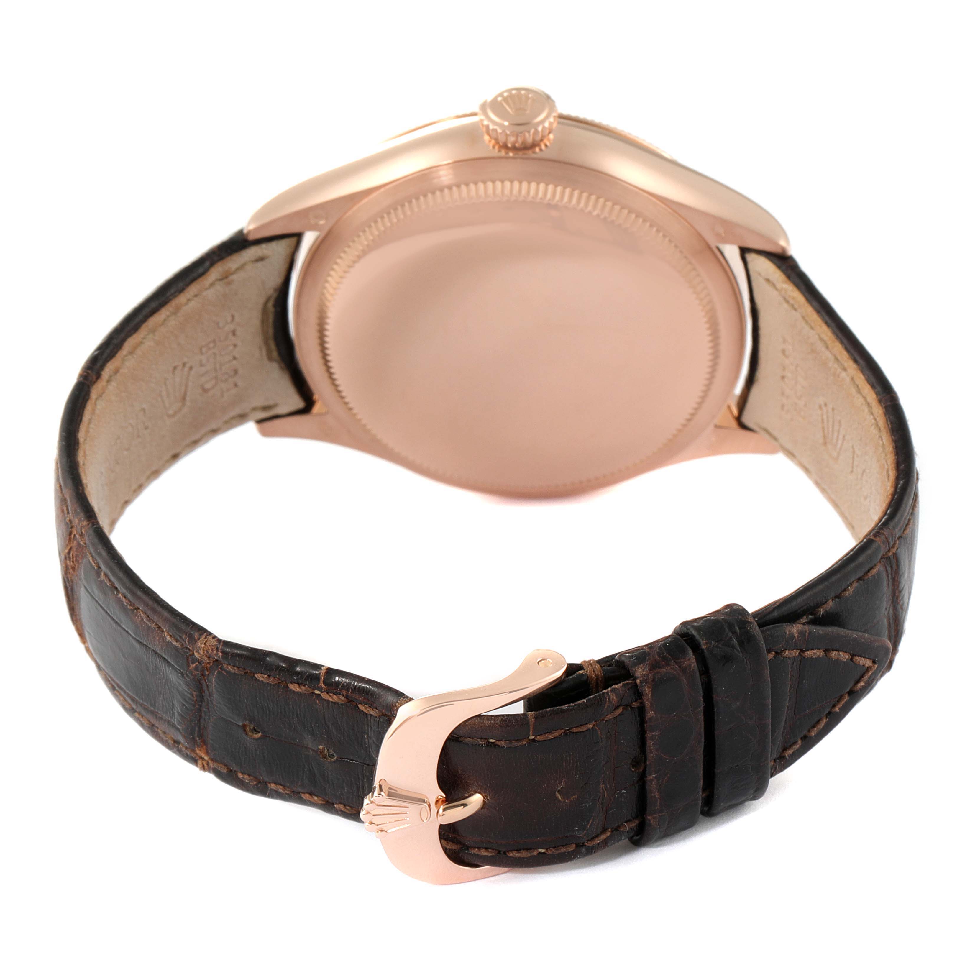 The image shows the back angle of a Rolex Cellini 50505 Men's Rose Gold White Dial 50505 Men's Rose Gold White Dial watch, highlighting its case, crown, and leather strap with a clasp.