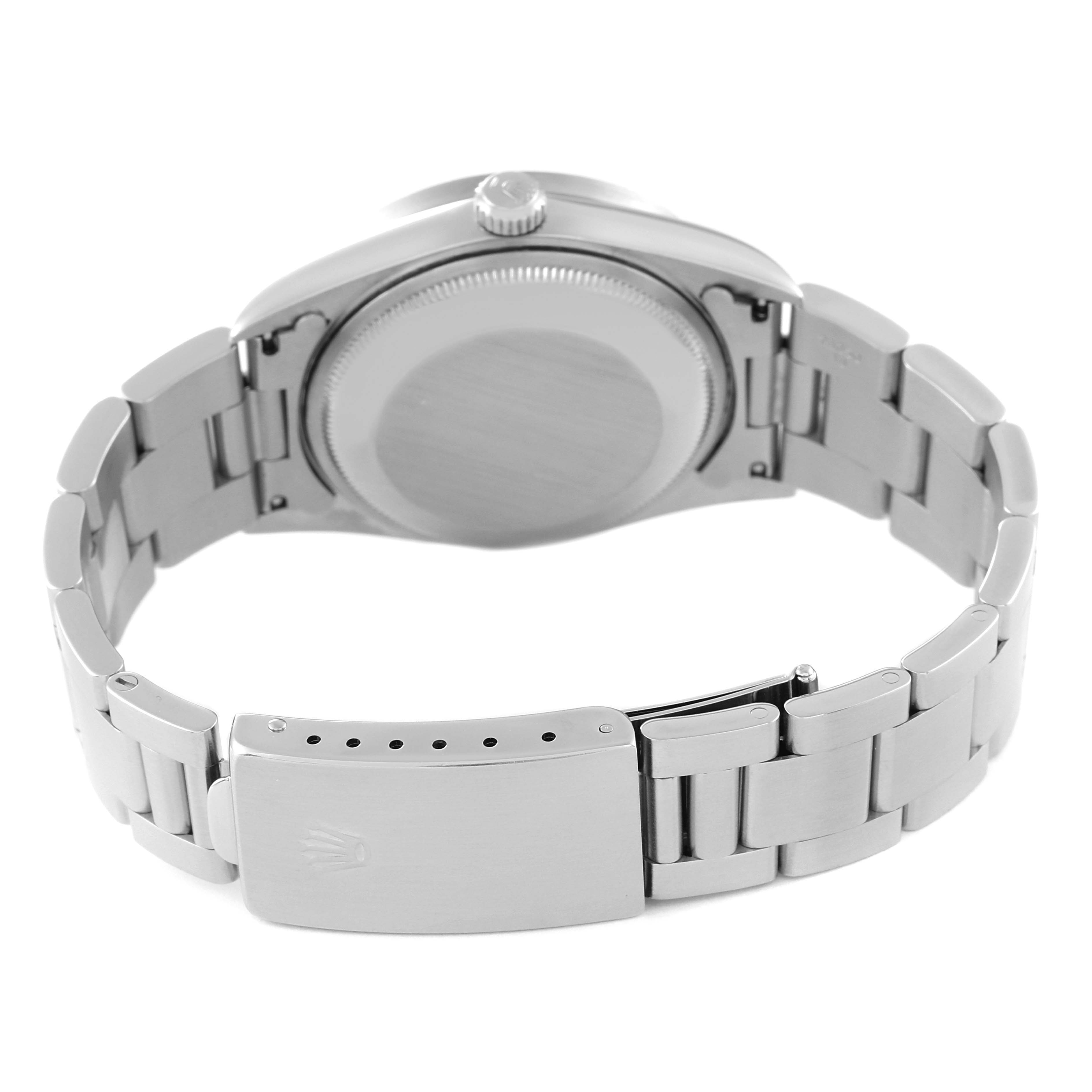 This image shows the back case and bracelet clasp of a Rolex Date 15210 Men's Stainless Steel Black Dial 15210 Men's Stainless Steel Black Dial model watch.