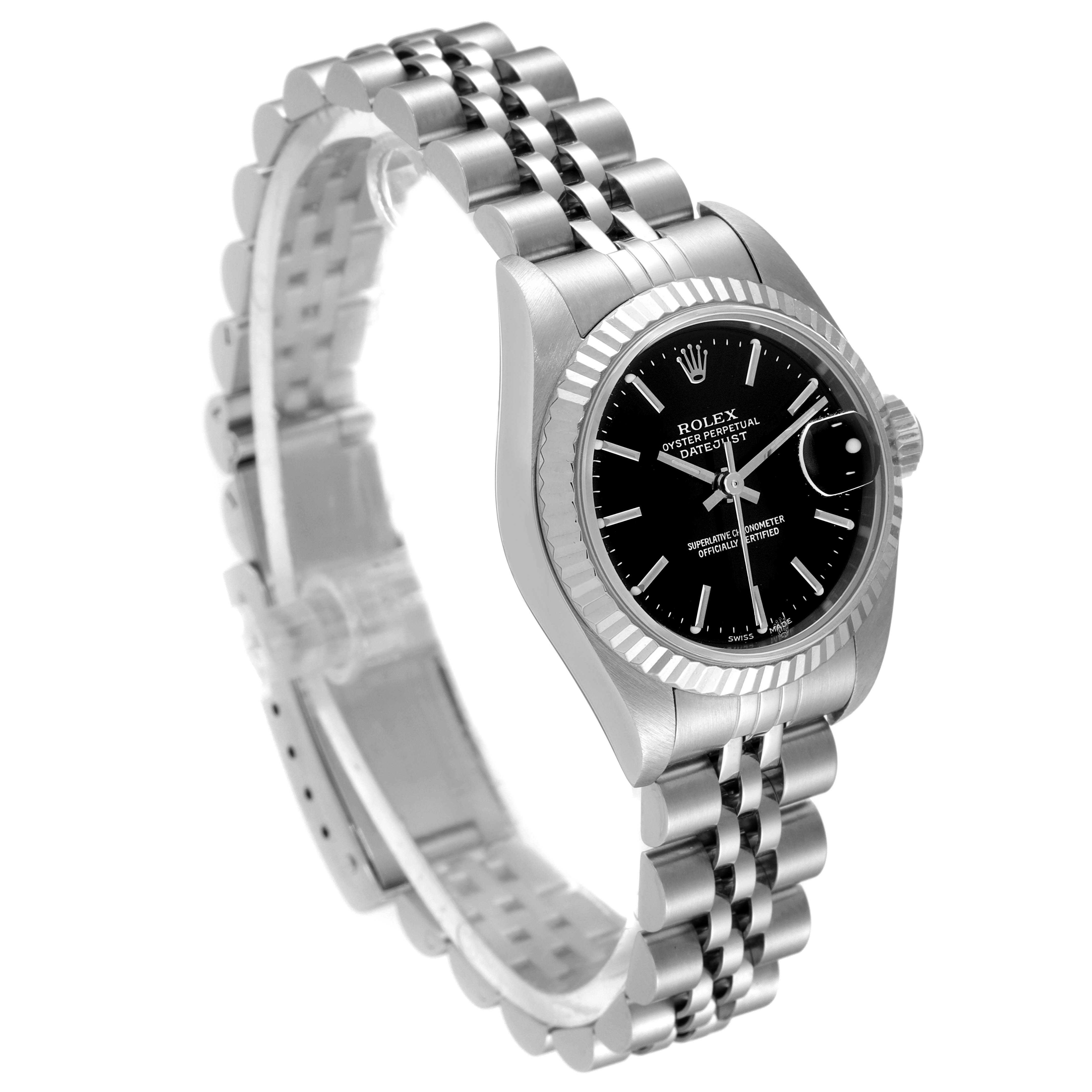 The Rolex Datejust 79174 Women's Stainless Steel Black Dial 79174 Women's Stainless Steel Black Dial watch is shown at an angle, displaying the watch face, bezel, and bracelet in a three-quarter view.