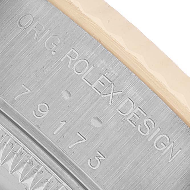 The image shows an engraved side view of a Rolex Datejust 79173 Women's Steel and Gold (two tone) Black Dial case with the model number visible.