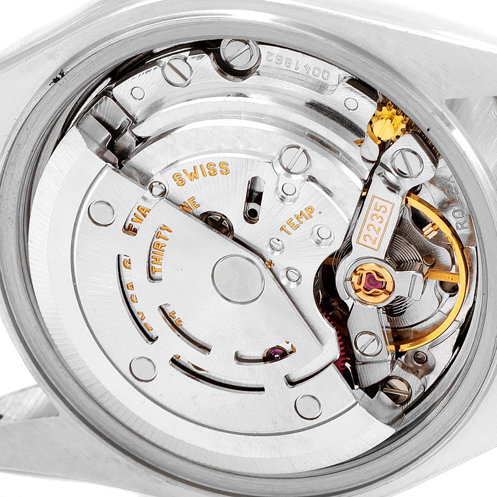 This image shows a close-up view of the movement mechanism inside a Rolex Datejust 79173 Women's Steel and Gold (two tone) White Dial 79173 Women's Steel and Gold (two tone) White Dial watch.