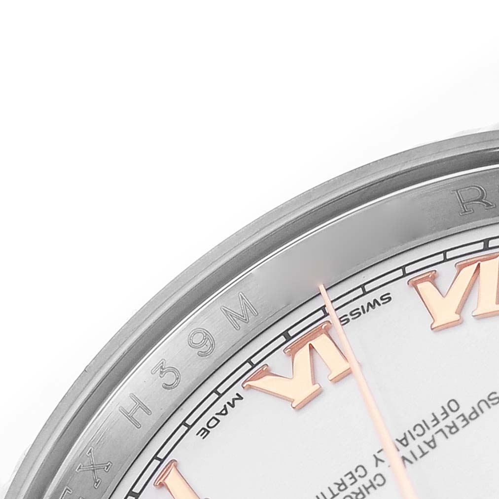 The image shows a close-up of the dial edge and Roman numerals of a Rolex Datejust 116231 Men's Steel and Gold (two tone) White Dial watch.