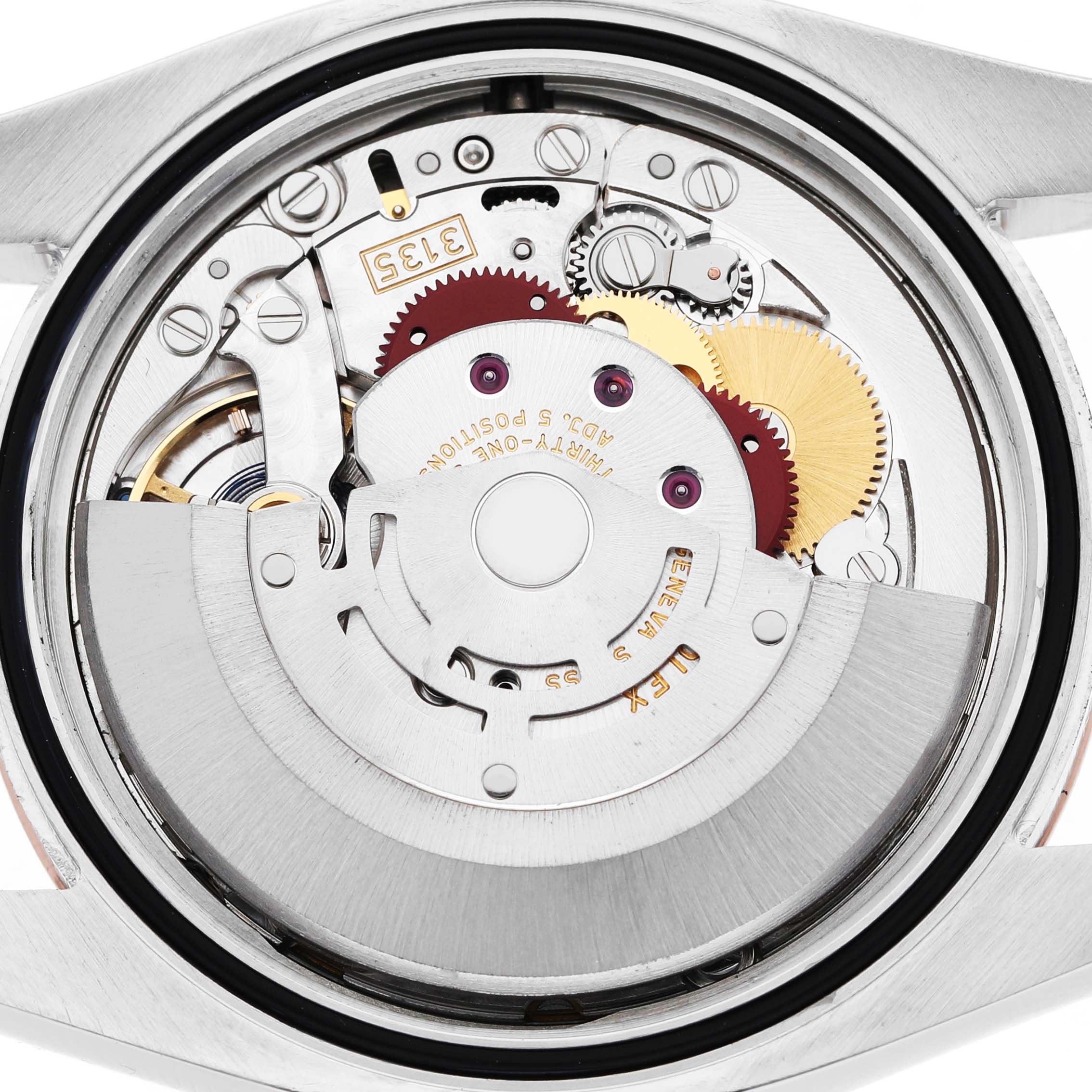 The image shows the movement from the back, highlighting the gears and components of a Rolex Datejust 116231 Men's Steel and Gold (two tone) White Dial watch.