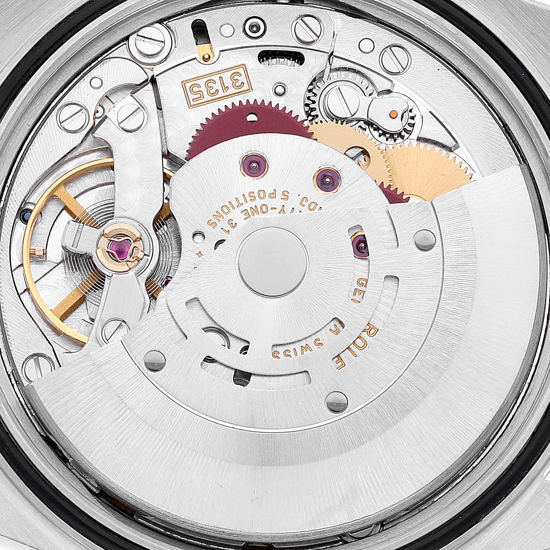 The image shows a close-up of the Rolex Datejust 16234 Men's Stainless Steel Silver Dial 16234 Men's Stainless Steel Silver Dial watch's internal movement, including gears, jewels, and the rotor.
