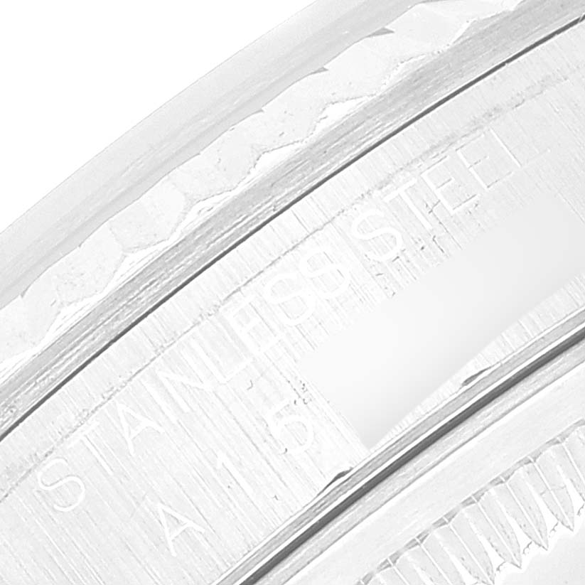 This image shows a close-up angle of the stainless steel rim or casing of the Rolex Datejust 16234 Men's Stainless Steel Silver Dial 16234 Men's Stainless Steel Silver Dial watch.