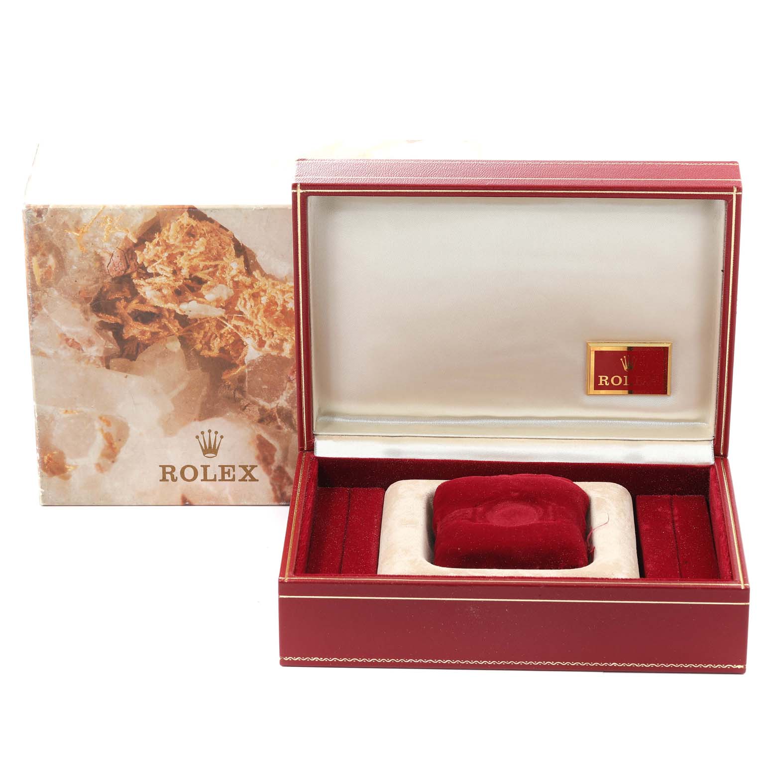 The image shows an open Rolex watch box for the President model, displaying red interior lining and a cushion.