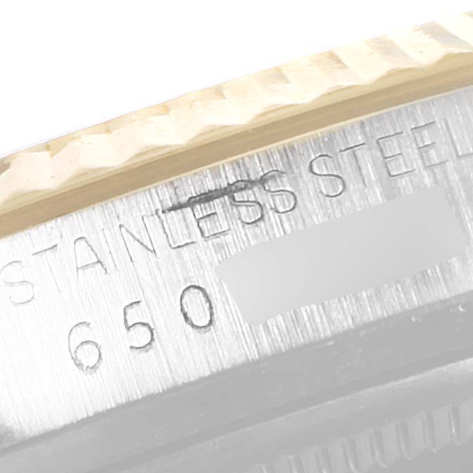 The image shows a close-up of the stainless steel case with engraved details of the Rolex Vintage Collection 16013 Men's Steel and Gold (two tone) White Dial 16013 Men's Steel and Gold (two tone) White Dial model.