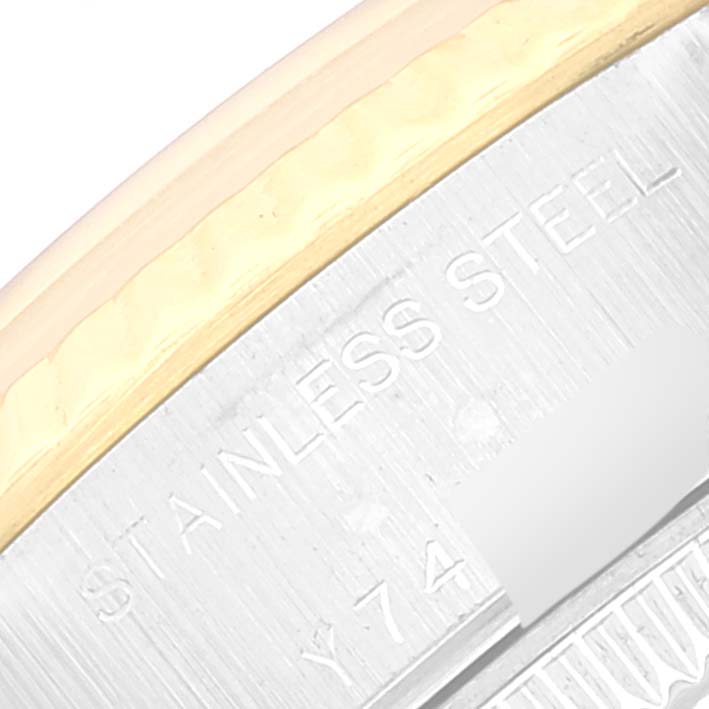 This image shows a close-up of the side of a Rolex Datejust 79173 Women's Steel and Gold (two tone) Mother of Pearl Dial 79173 Women's Steel and Gold (two tone) Mother of Pearl Dial, highlighting the stainless steel and gold materials.