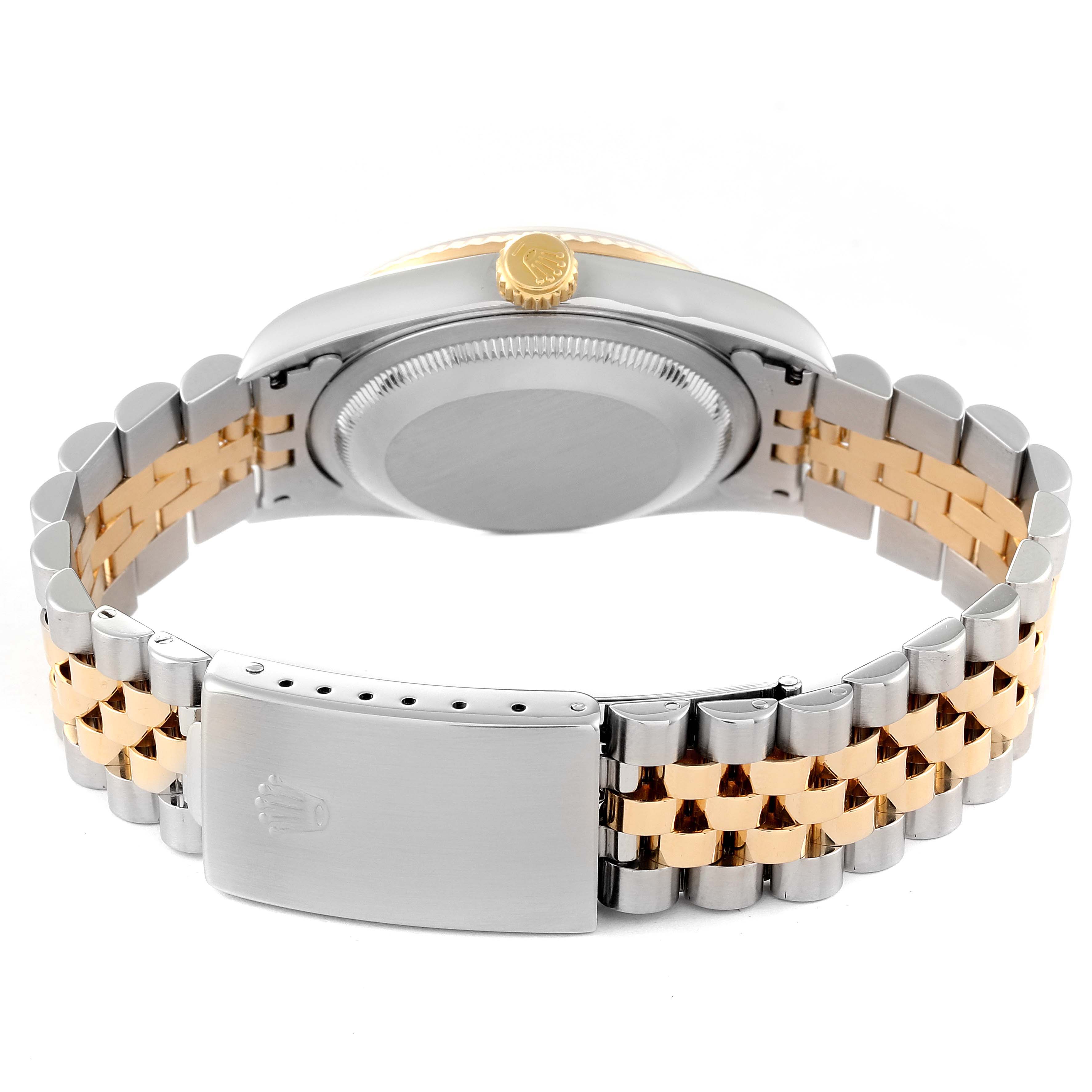 This image shows the back view of a Rolex Datejust 16233 Men's Steel and Gold (two tone) Mother of Pearl Dial 16233 Men's Steel and Gold (two tone) Mother of Pearl Dial watch, highlighting the case back, crown, and two-tone bracelet with clasp.