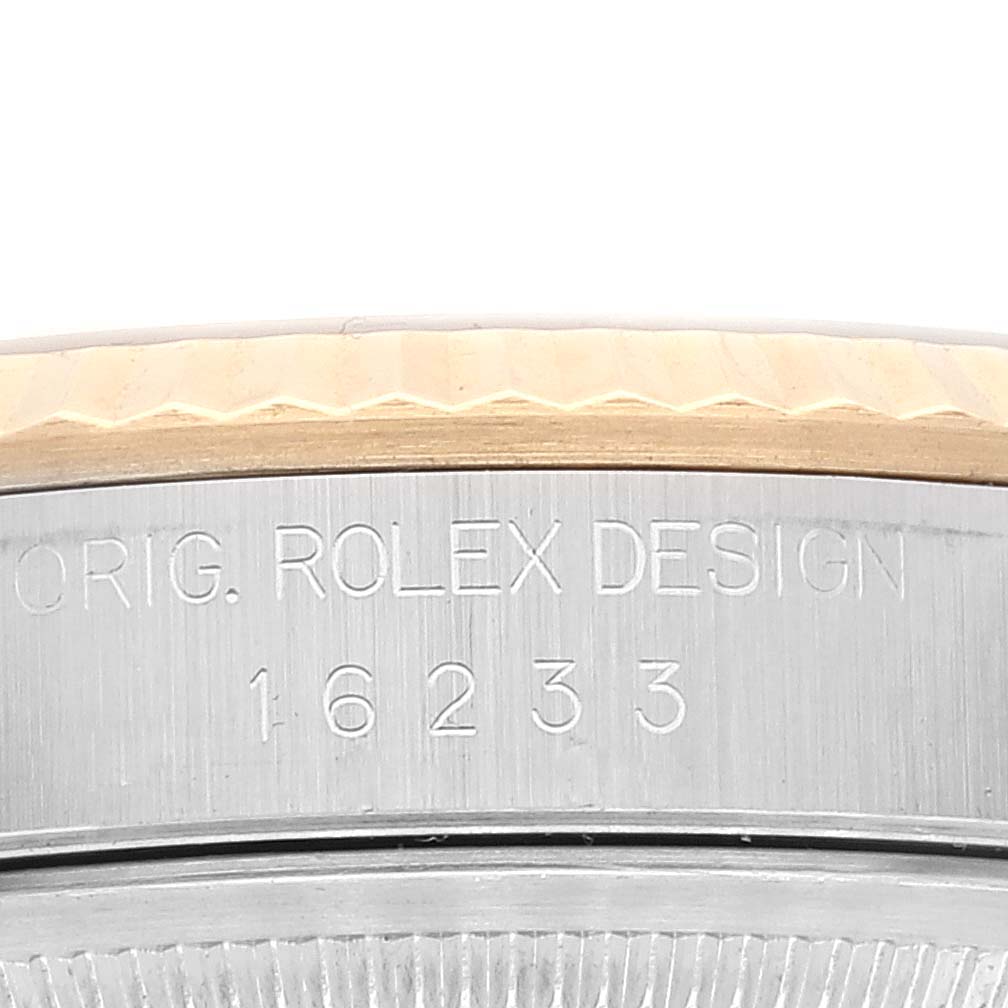The image shows a close-up of the case back edge of a Rolex Datejust 16233 Men's Steel and Gold (two tone) White Dial 16233 Men's Steel and Gold (two tone) White Dial watch, featuring the model number "16233."