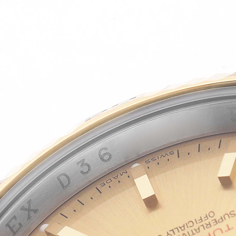 The image shows a close-up of the bezel and dial edge of a Rolex Turn-o-Graph 116263 Men's Steel and Gold (two tone) Champagne Dial watch, highlighting the markings and hour marker.