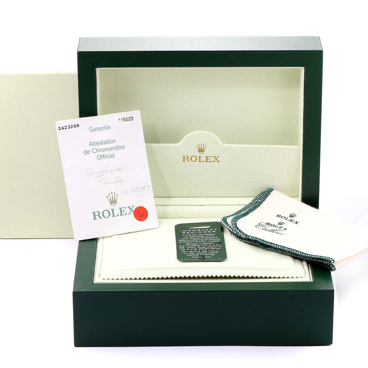 The image shows the packaging and accessories for the Rolex Daytona 116523 Men's Steel and Gold (two tone) Silver Dial 116523 Men's Steel and Gold (two tone) Silver Dial watch, including certification papers, a cleaning cloth, and the box.