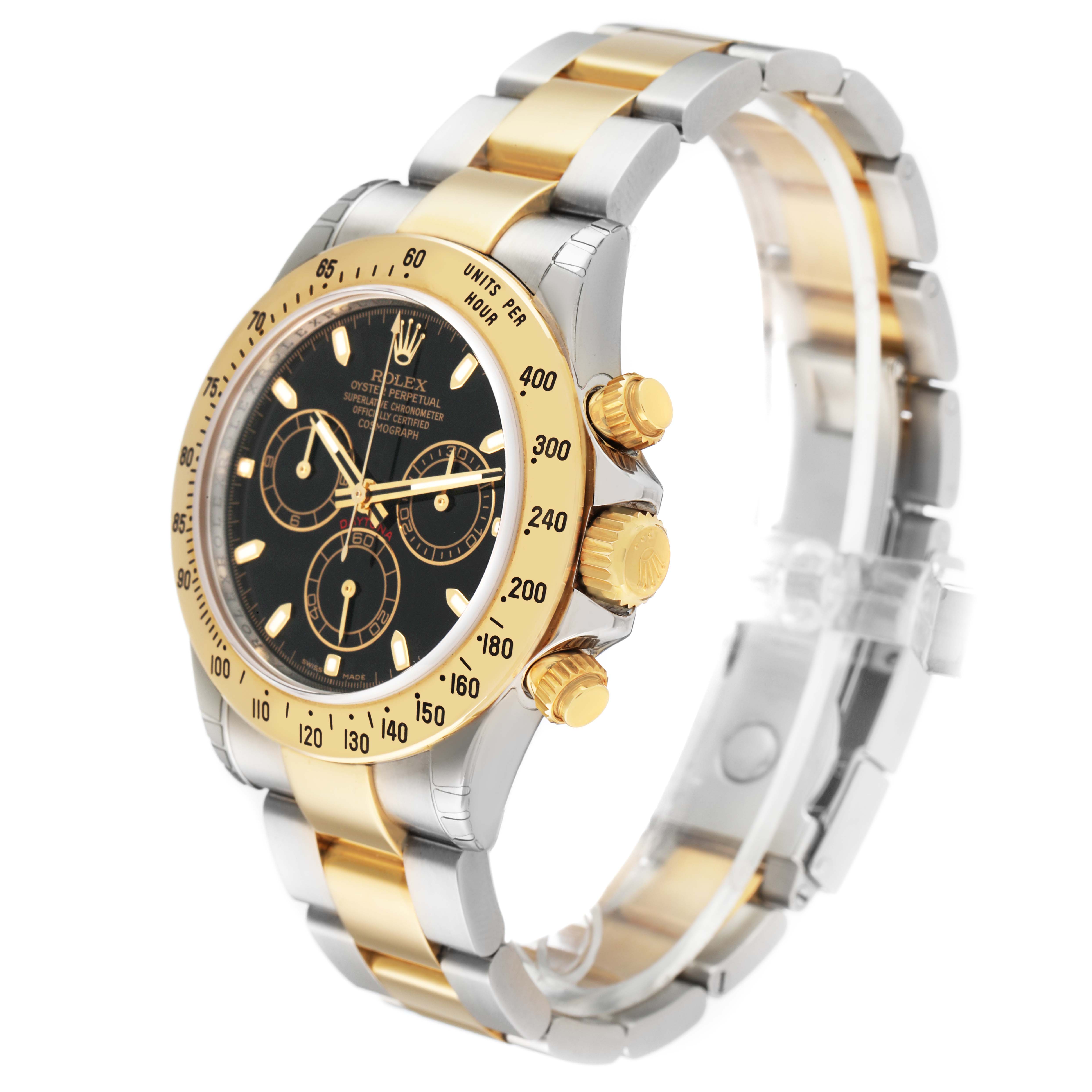The Rolex Daytona 116523 Men's Steel and Gold (two tone) Black Dial watch is shown at a three-quarter angle, highlighting its gold bezel, black dial, and two-tone bracelet.