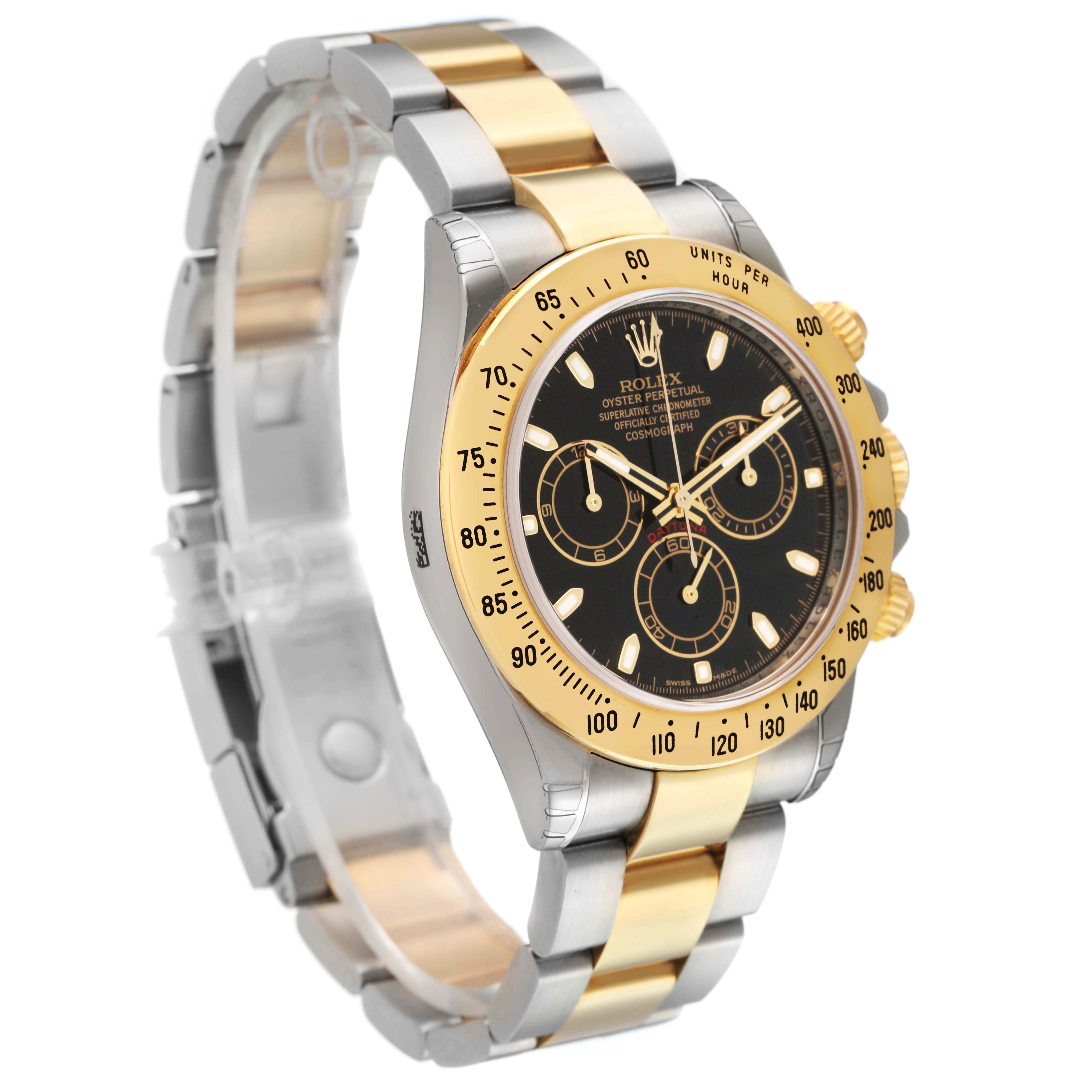 The image shows a side angle of a Rolex Daytona 116523 Men's Steel and Gold (two tone) Black Dial watch, highlighting its two-tone bracelet, black dial, and gold bezel.