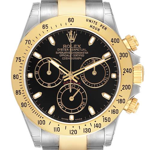 The Rolex Daytona 116523 Men's Steel and Gold (two tone) Black Dial watch is shown from the front, highlighting its black dial, gold bezel, and chronograph sub-dials.