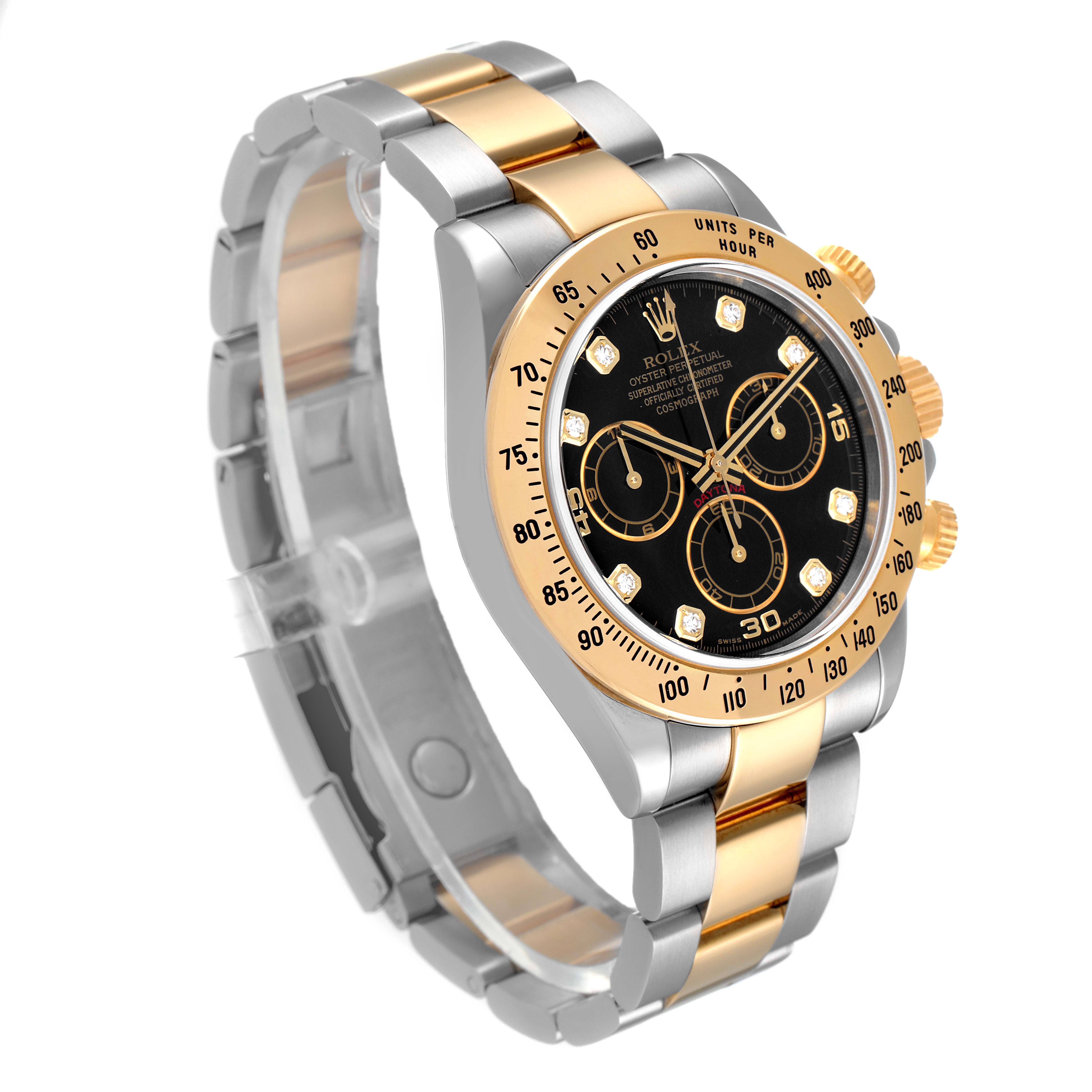 This image shows a Rolex Daytona 116523 Men
s Steel and Gold (two tone) Black Dial 116523 Men
s Steel and Gold (two tone) Black Dial watch at a three-quarter angle, highlighting its black dial, gold and silver bracelet, and chronograph features.