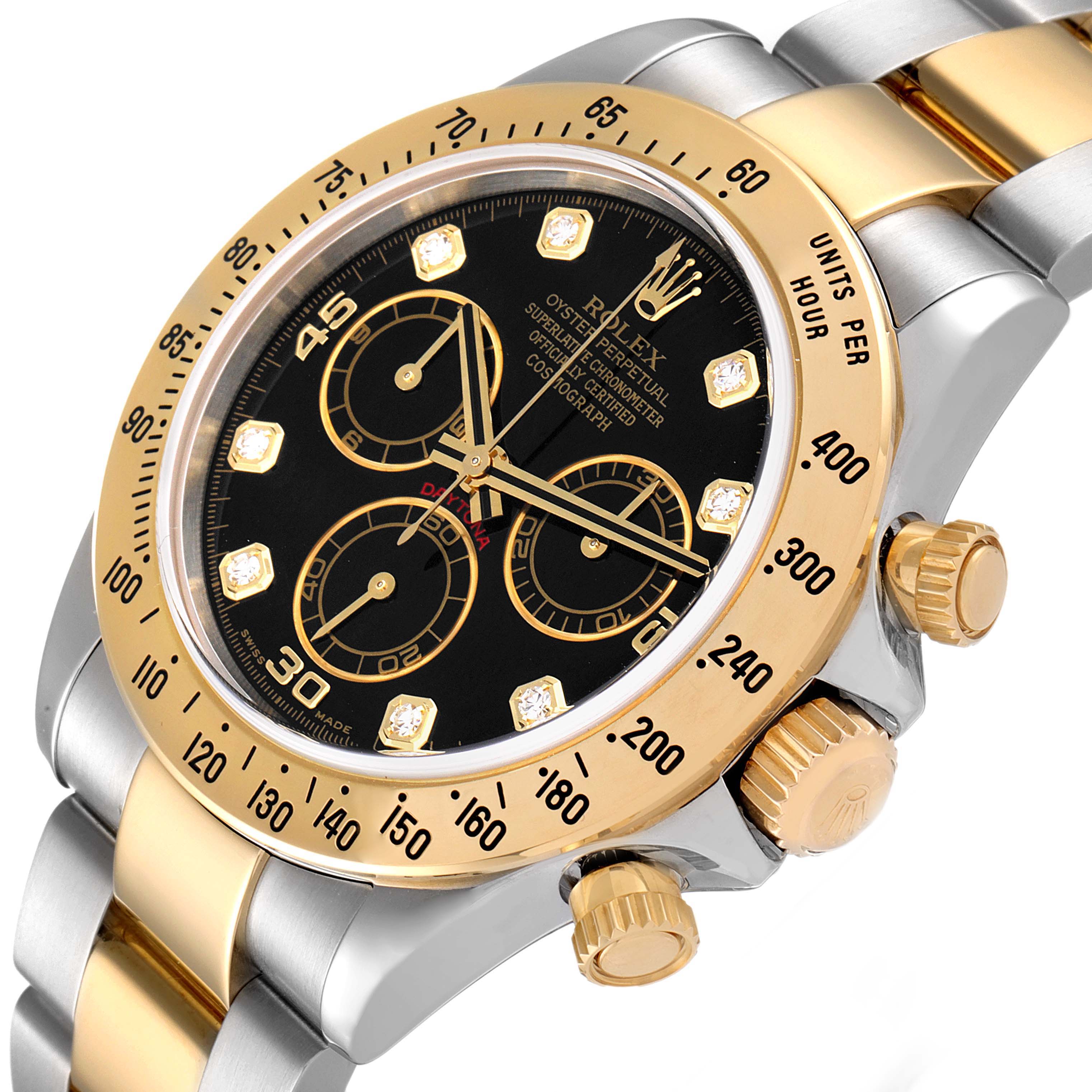 This image shows a close-up of the face, bezel, and part of the band and crown of a Rolex Daytona 116523 Men
s Steel and Gold (two tone) Black Dial 116523 Men
s Steel and Gold (two tone) Black Dial watch.