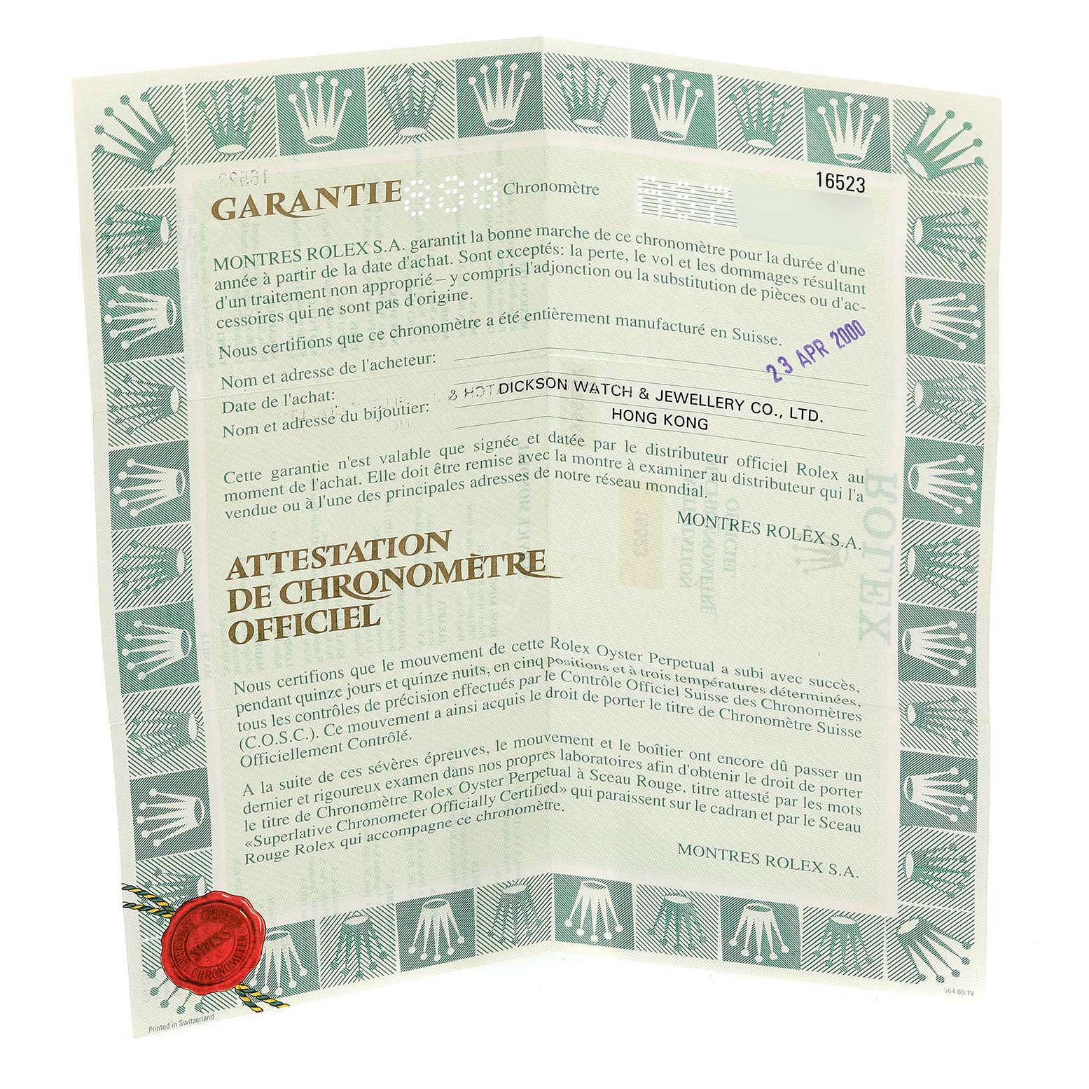 The image shows a warranty certificate for a Rolex Daytona 16523 Men
s Steel and Gold (two tone) White Dial 16523 Men
s Steel and Gold (two tone) White Dial watch, with text and a red seal.