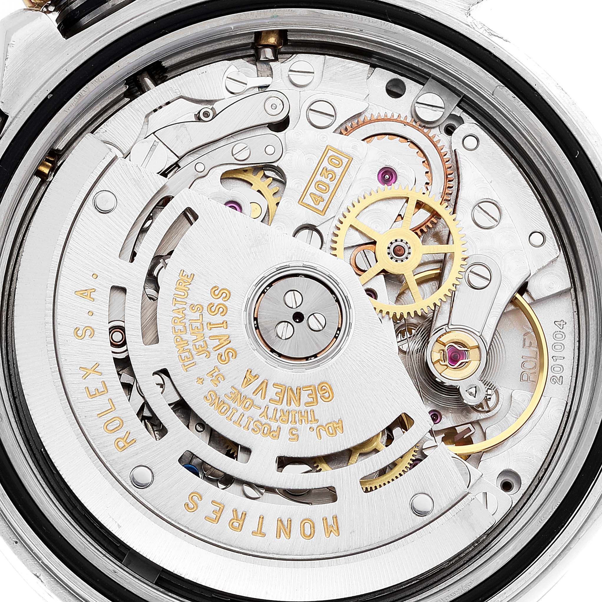 This image shows a close-up view of the movement mechanism inside a Rolex Daytona 16523 Men
s Steel and Gold (two tone) White Dial 16523 Men
s Steel and Gold (two tone) White Dial watch.