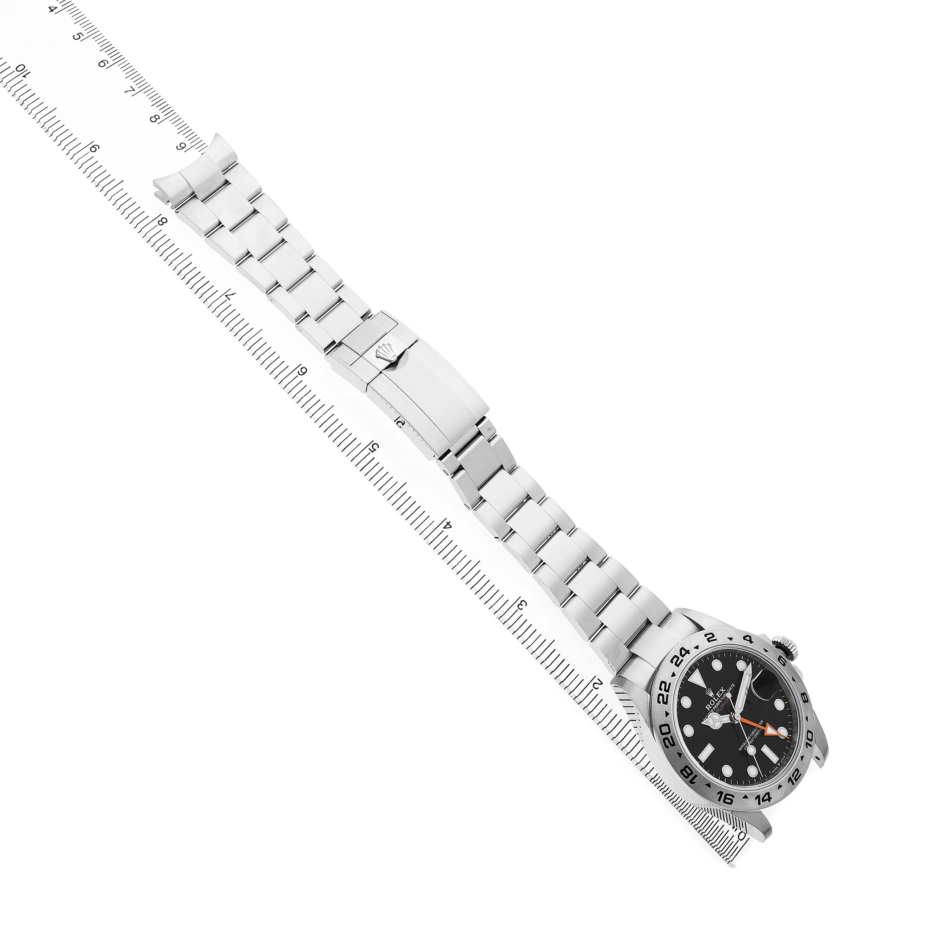 The Rolex Explorer 226570 Men's Stainless Steel Black Dial watch is shown at a diagonal angle, displaying the face, bezel, bracelet, and clasp.