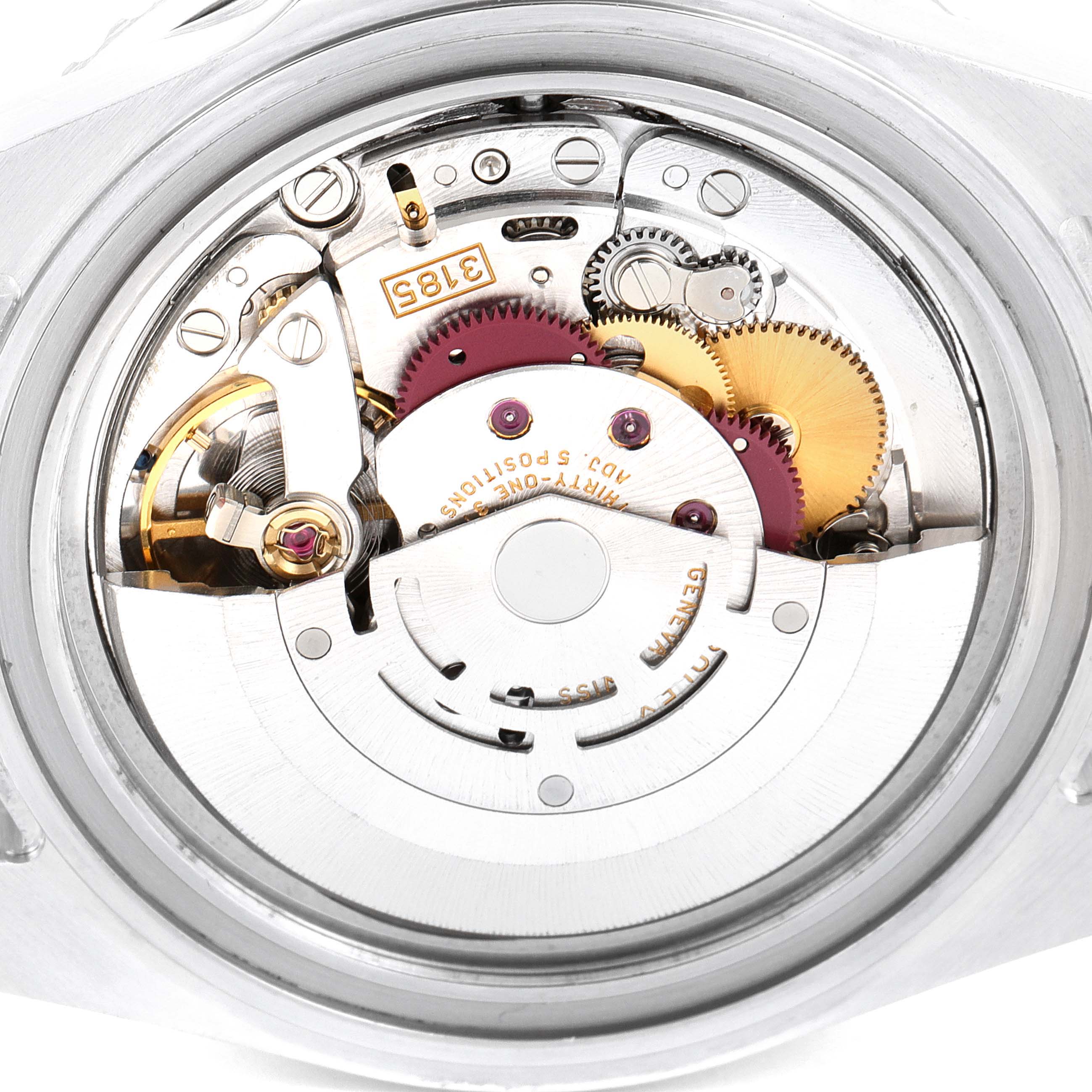 This image shows a close-up view of the movement of a Rolex GMT-Master 16710 Men
s Stainless Steel Black Dial 16710 Men
s Stainless Steel Black Dial watch, highlighting its intricate gears and mechanisms.