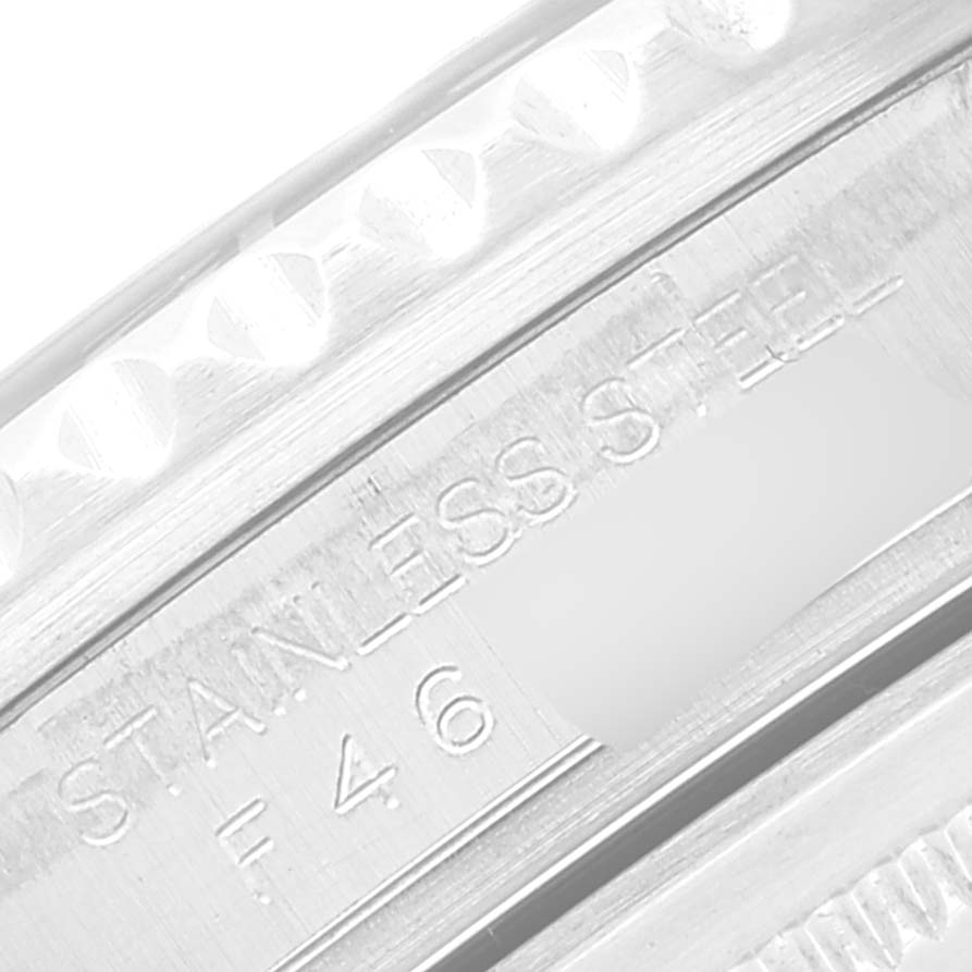 The image shows a close-up view of the stainless steel bezel and engravings on a Rolex GMT-Master 16710 Men
s Stainless Steel Black Dial 16710 Men
s Stainless Steel Black Dial watch.