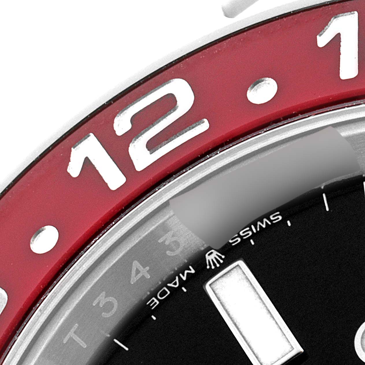 This close-up image of the Rolex GMT-Master 126710 Men
s Stainless Steel Black Dial 126710 Men
s Stainless Steel Black Dial watch shows the bezel and part of the dial with hour markers.