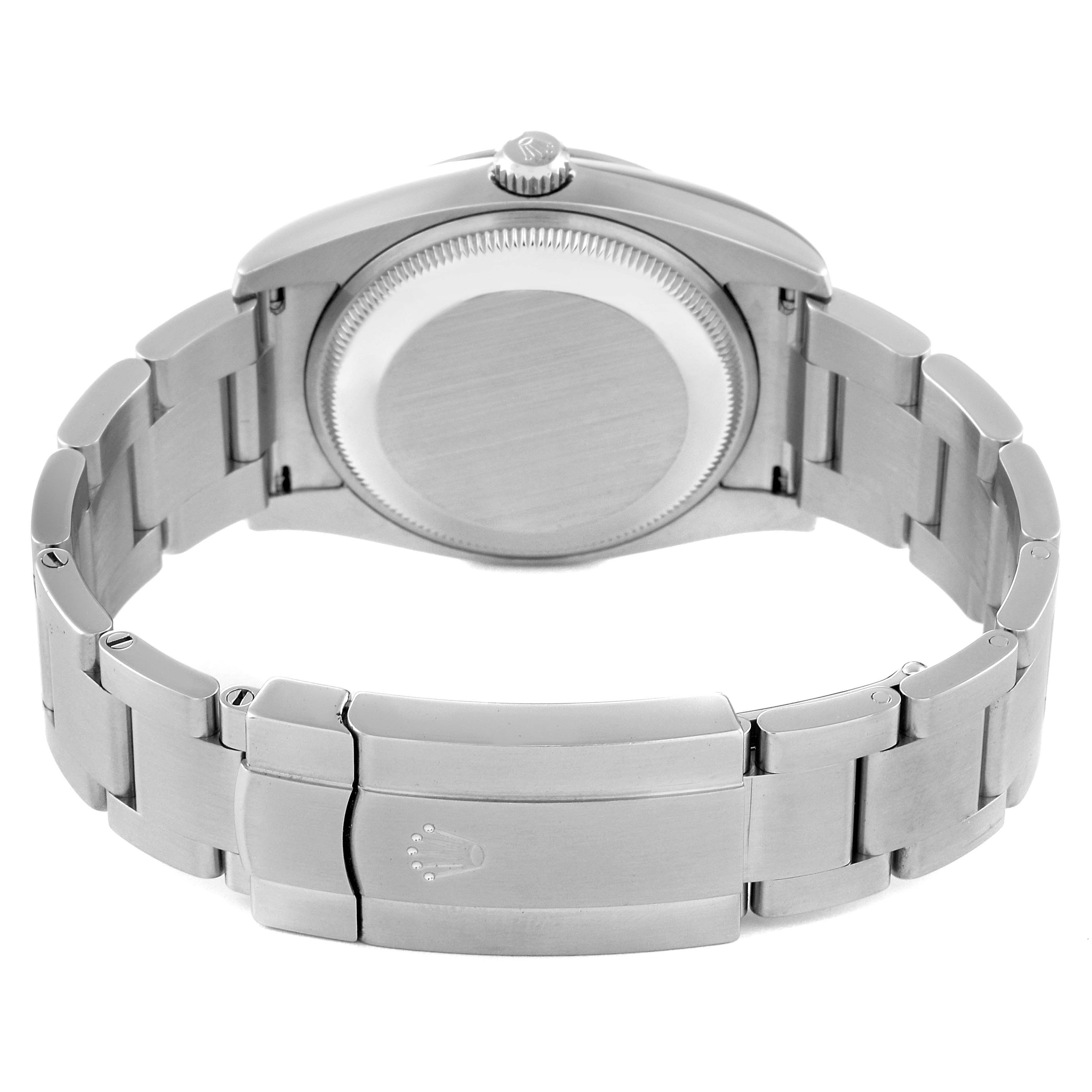 The image shows the back view of a Rolex Oyster Perpetual 114200 Men
s Stainless Steel Green Dial 114200 Men
s Stainless Steel Green Dial watch, highlighting the case back, bracelet, and clasp.