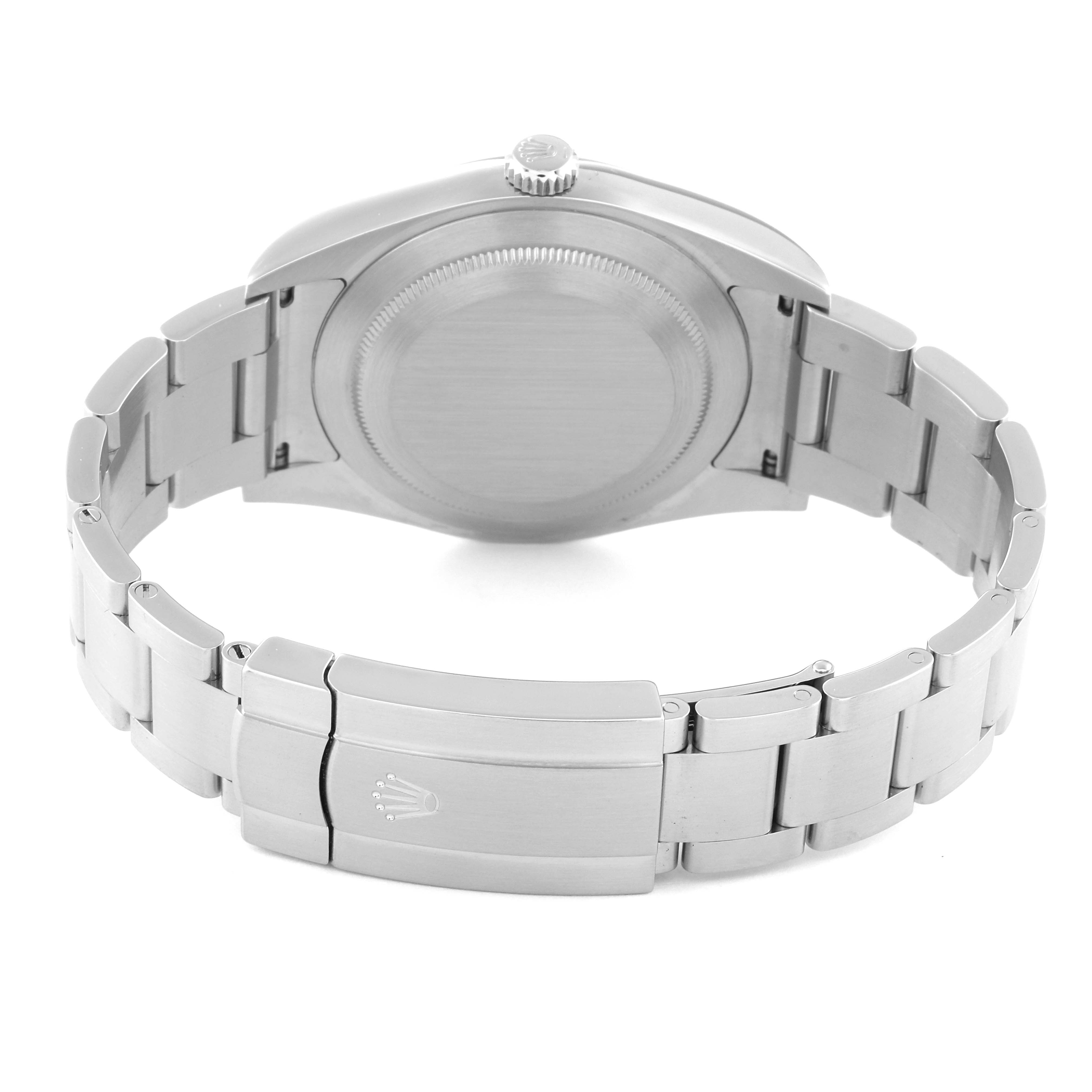 The image shows the back view of a Rolex Oyster Perpetual 114300 Men
s Stainless Steel Grey Dial 114300 Men
s Stainless Steel Grey Dial watch, highlighting the closed clasp and metal bracelet.