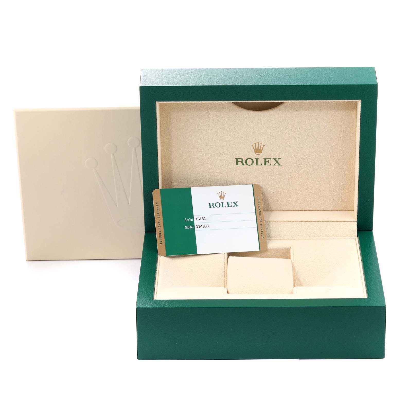 This image shows the packaging and Best Quality
ity card for a Rolex Oyster Perpetual 114300 Men
s Stainless Steel Grey Dial 114300 Men
s Stainless Steel Grey Dial model.