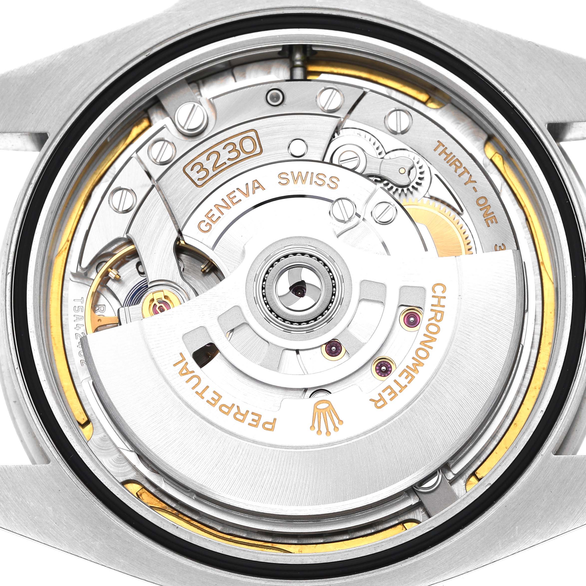 The image shows a close-up of the Rolex Air-King 126900 Men's Stainless Steel Black Dial watch's movement, highlighting the intricate mechanics and rotor.