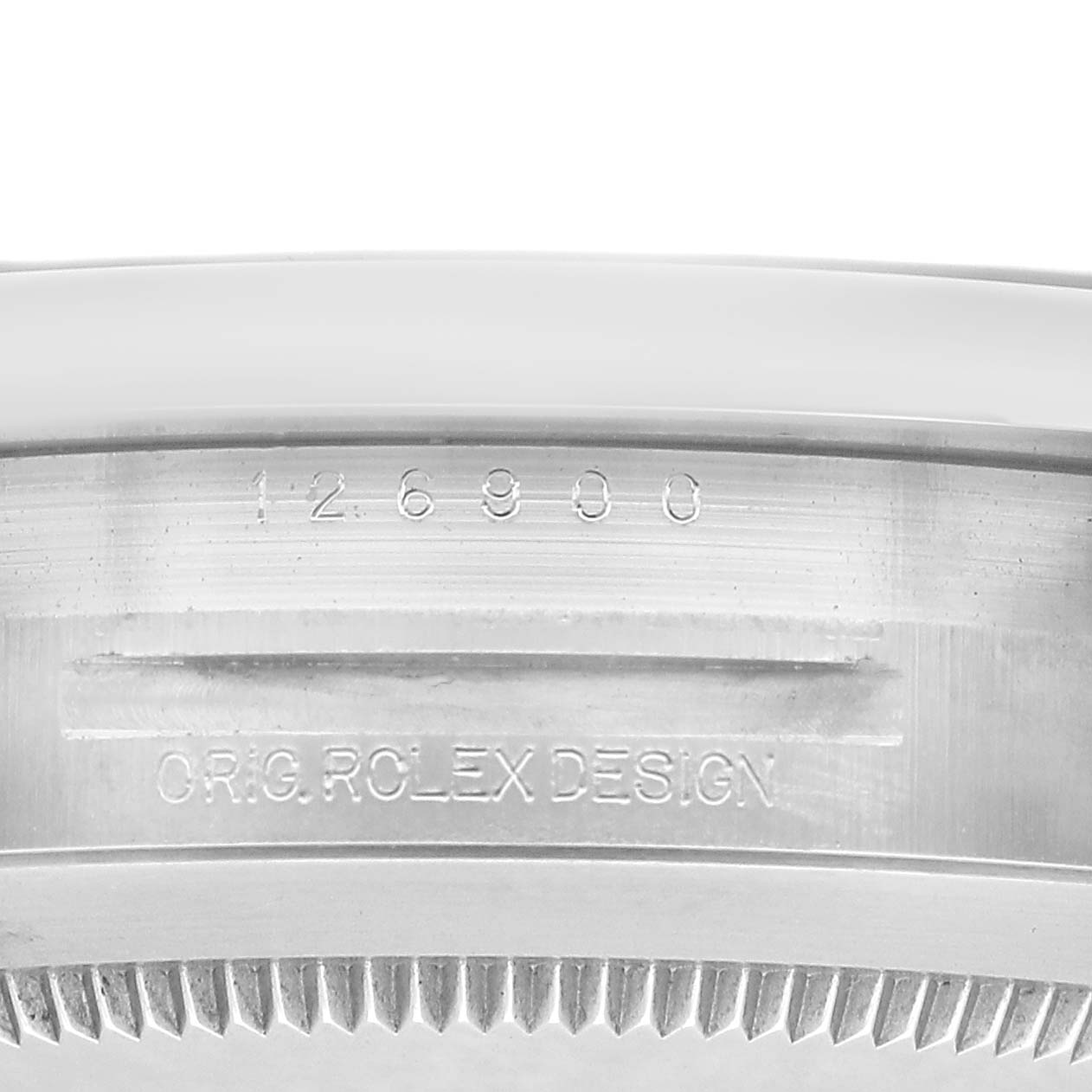 The image shows the side engraving on a Rolex Air-King 126900 Men's Stainless Steel Black Dial watch case, displaying the model number and "ORIG. ROLEX DESIGN" text.