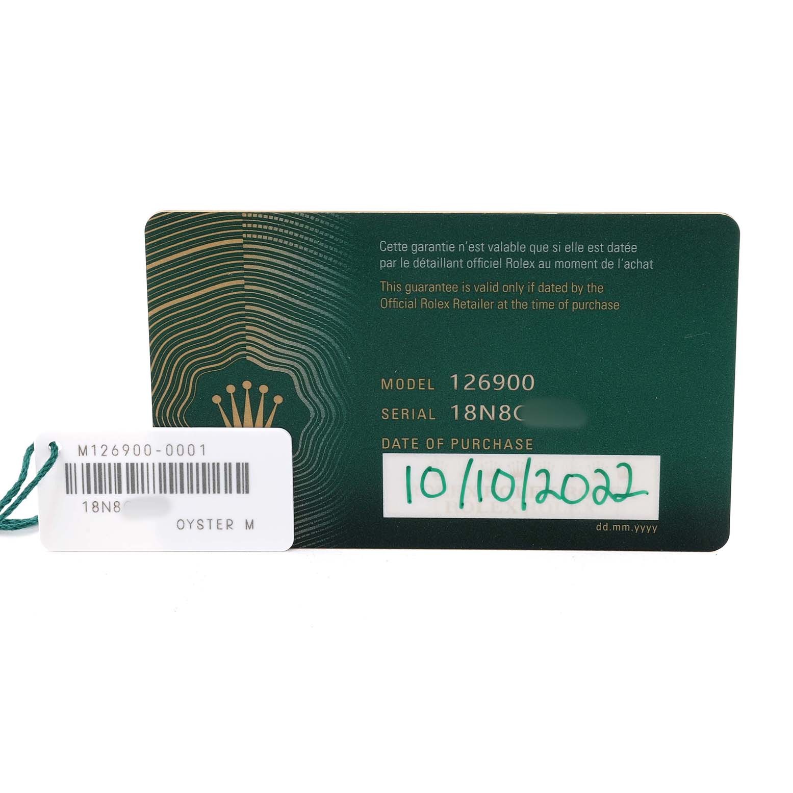 The image shows a Rolex Air-King 126900 Men's Stainless Steel Black Dial model with its warranty card and hang tag, displaying model and serial numbers, and purchase date.