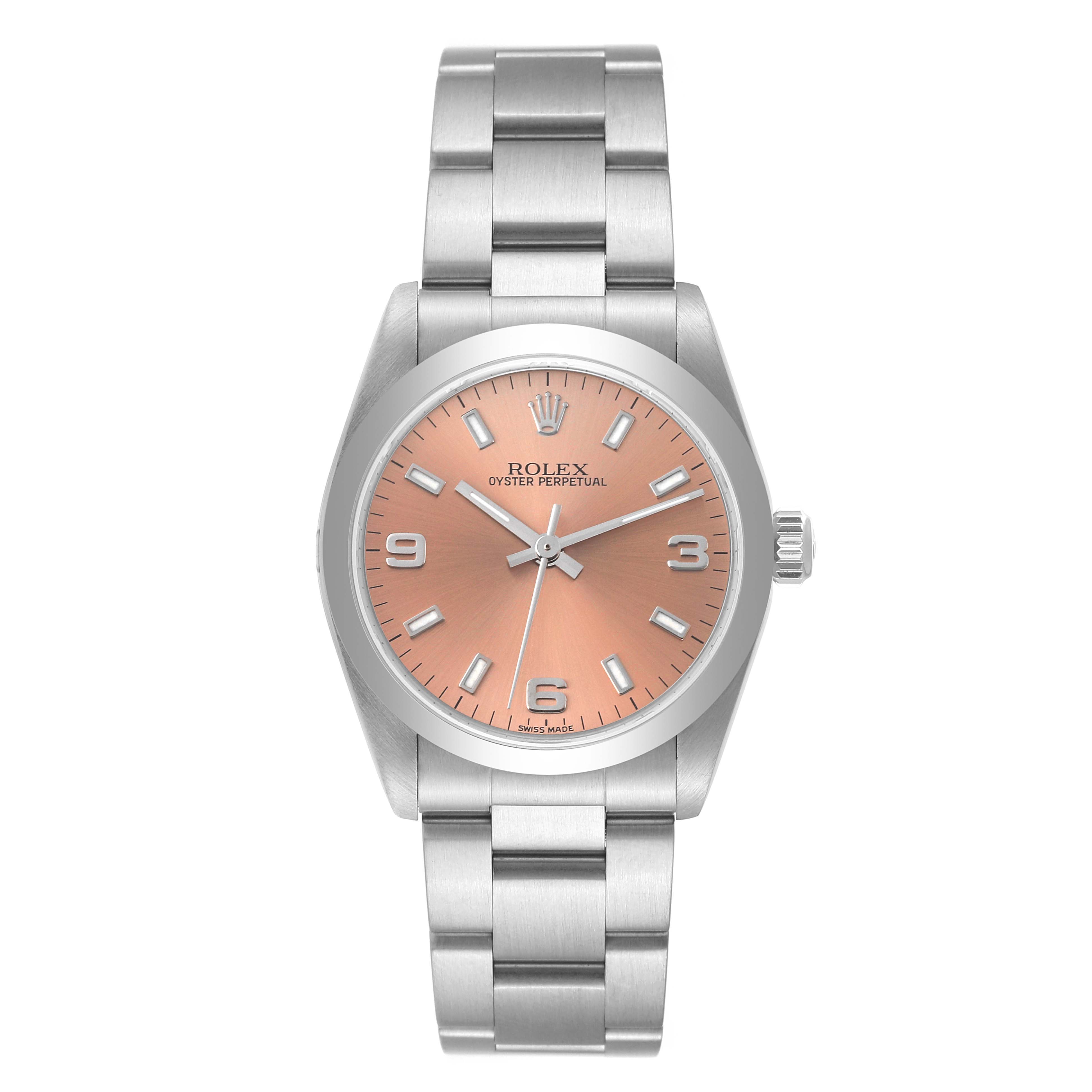 The Rolex Mid-Size 77080 Women
s Stainless Steel Pink Dial 77080 Women
s Stainless Steel Pink Dial Oyster Perpetual watch is shown from a top-down angle, displaying its face, bezel, and bracelet.