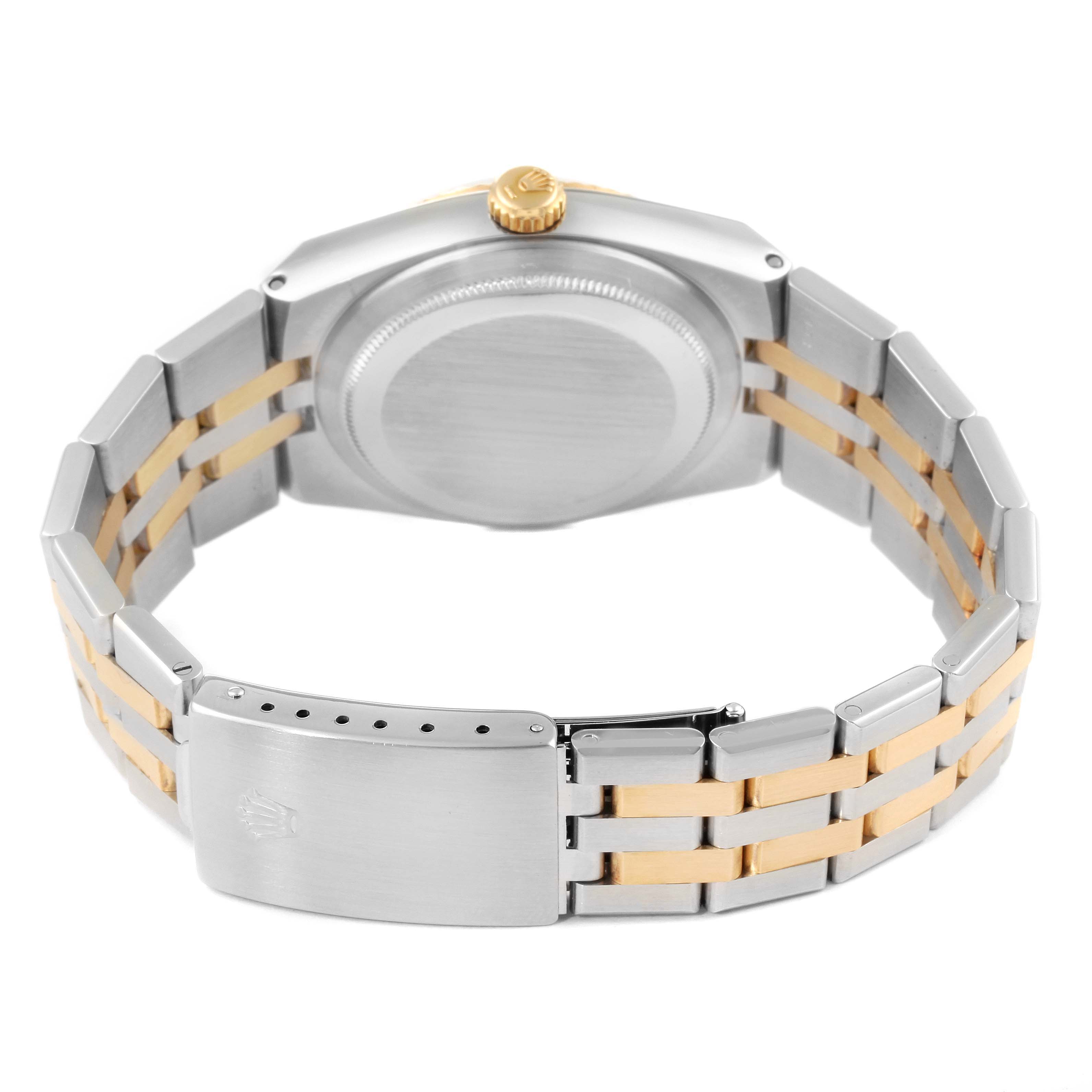 The image shows the back and bracelet of a Rolex Oysterquartz 17013 Men's Steel and Gold (two tone) Champagne Dial 17013 Men's Steel and Gold (two tone) Champagne Dial watch, showcasing its two-tone metal design.
