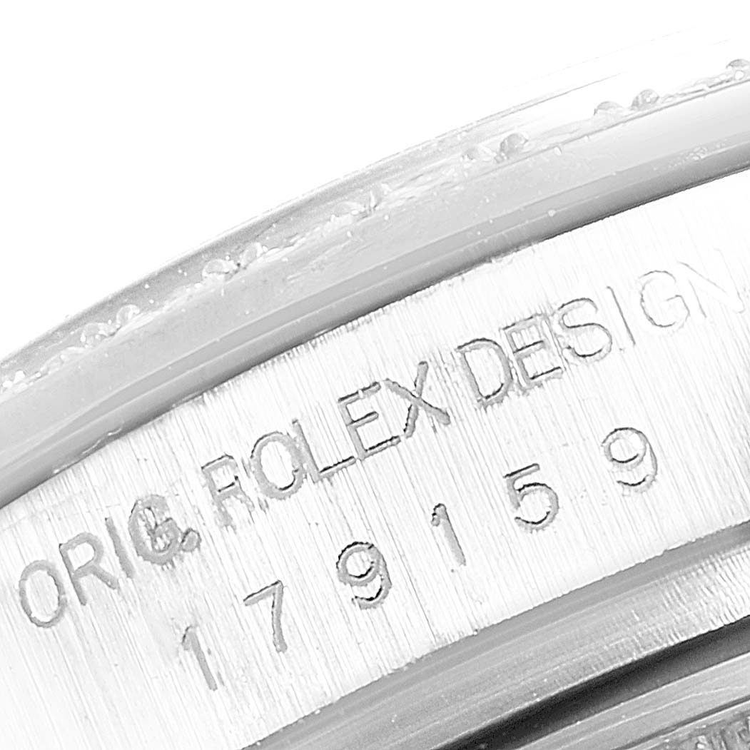 This image shows a close-up of the case reference number engraved on the side of a Rolex President 179159 Women's White Gold White Dial 179159 Women's White Gold White Dial model watch.