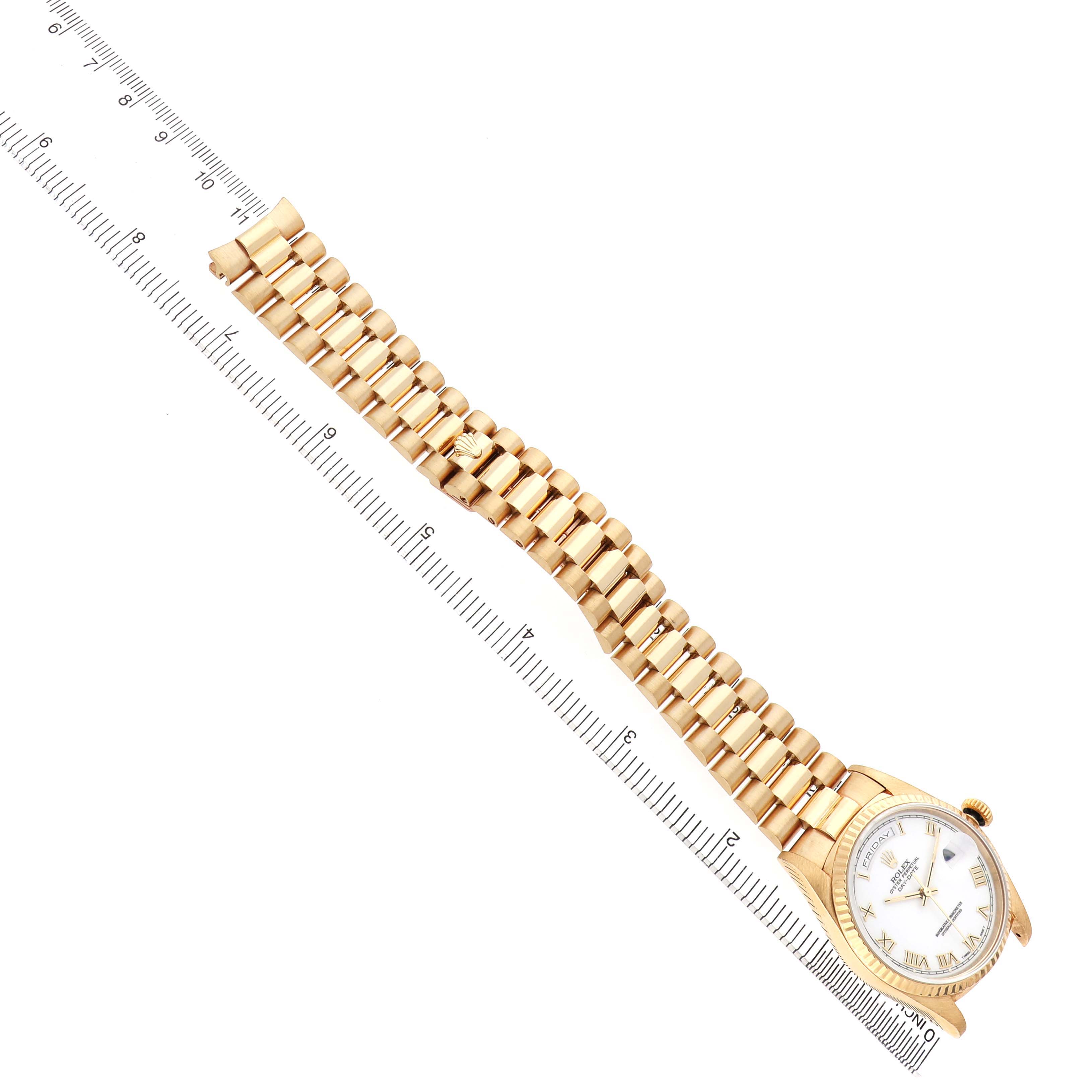 The image shows a side view of a gold Rolex President 18238 Men's Yellow Gold White Dial watch, displaying the bracelet and face at an angle.