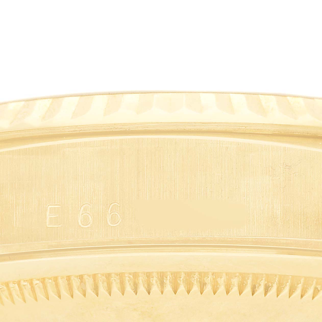 The image shows a close-up of the side view of the Rolex President 18238 Men's Yellow Gold White Dial model, focusing on the markings on the gold bezel.
