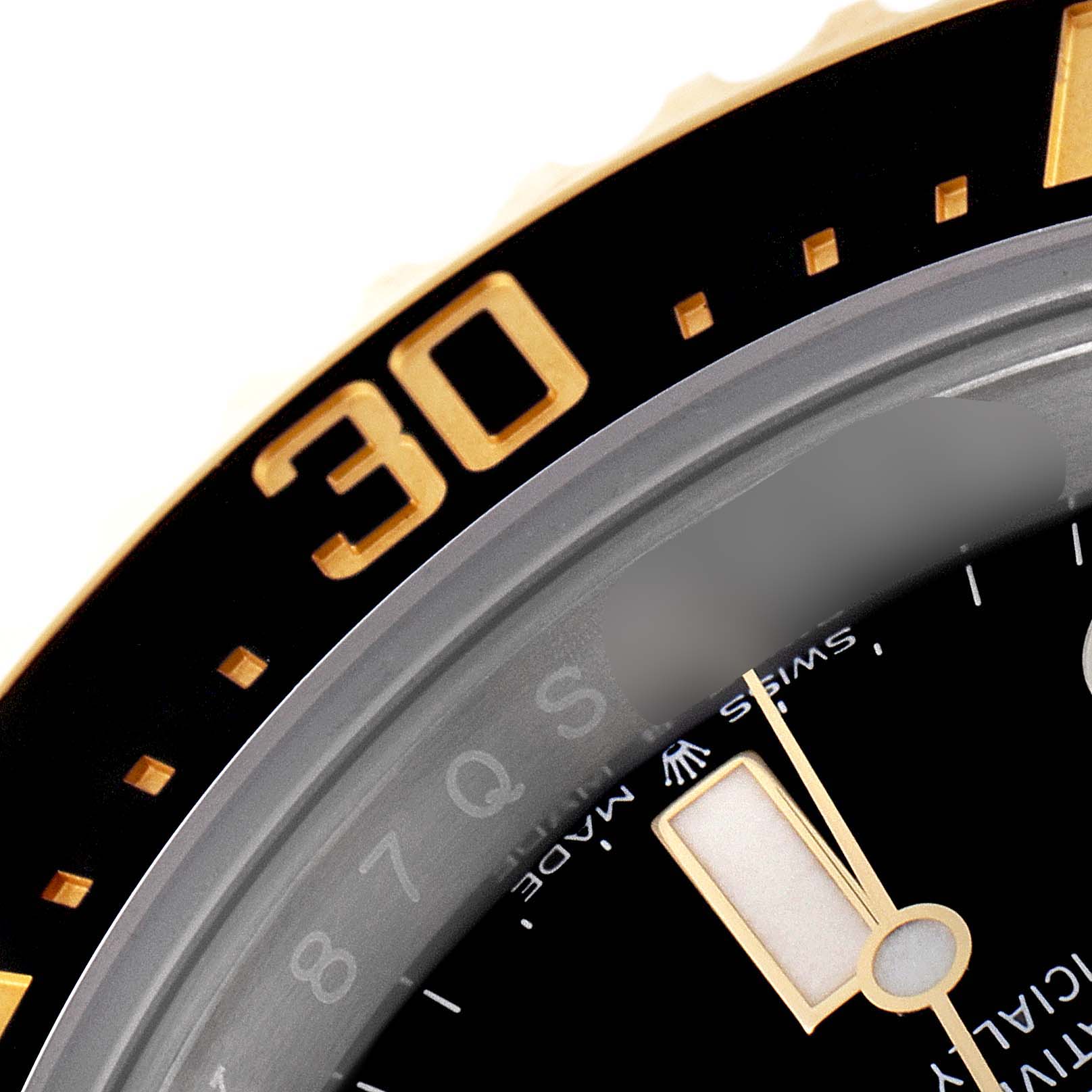 The close-up image of the Rolex Sea-Dweller 126603 Men's Steel and Gold (two tone) Black Dial 126603 Men's Steel and Gold (two tone) Black Dial watch shows the dial, part of the hour hand, and the "30" marking on the bezel.