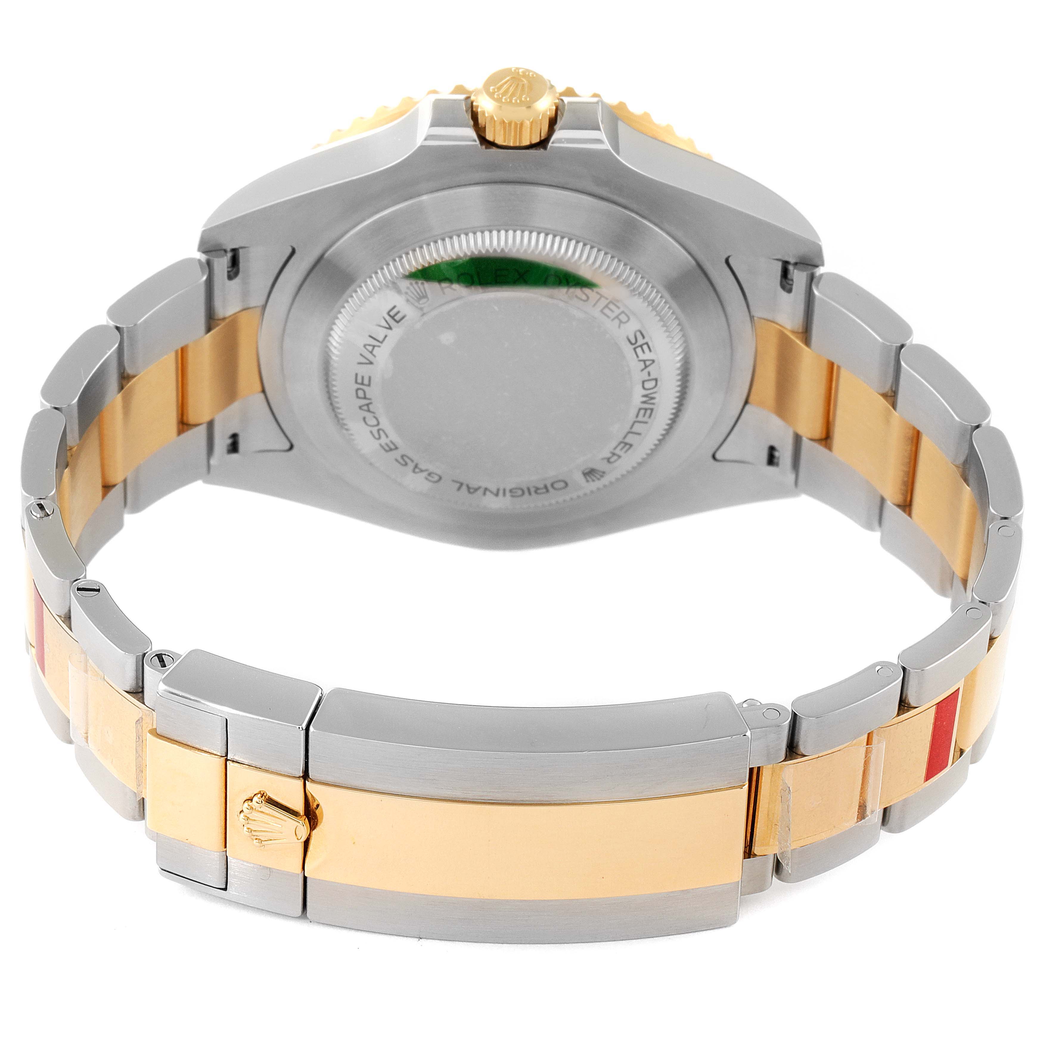 This image shows the backside and bracelet of a Rolex Sea-Dweller 126603 Men's Steel and Gold (two tone) Black Dial 126603 Men's Steel and Gold (two tone) Black Dial watch, highlighting the two-tone metal and clasp.