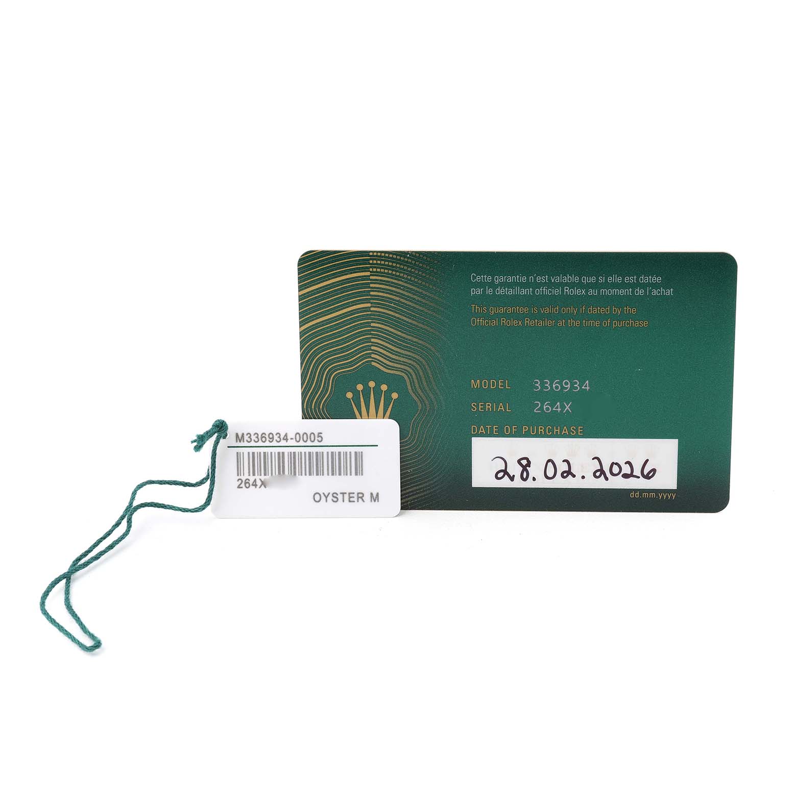 The image shows a guarantee card and tag for the Rolex Sky-Dweller 336934 Men's Stainless Steel Blue Dial model, displaying model and serial numbers, and purchase date.